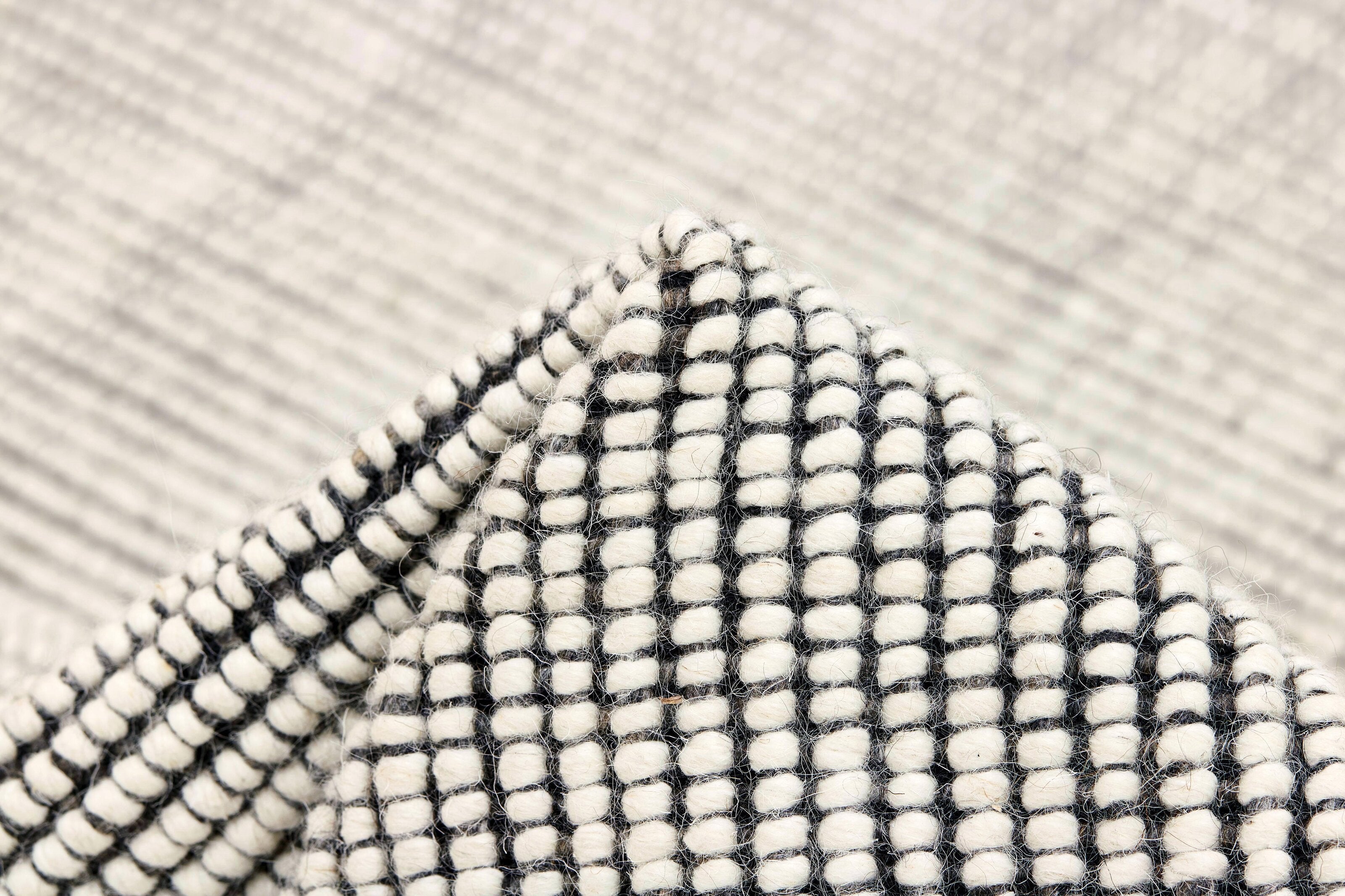Dark grey and white textured flatweave runner
