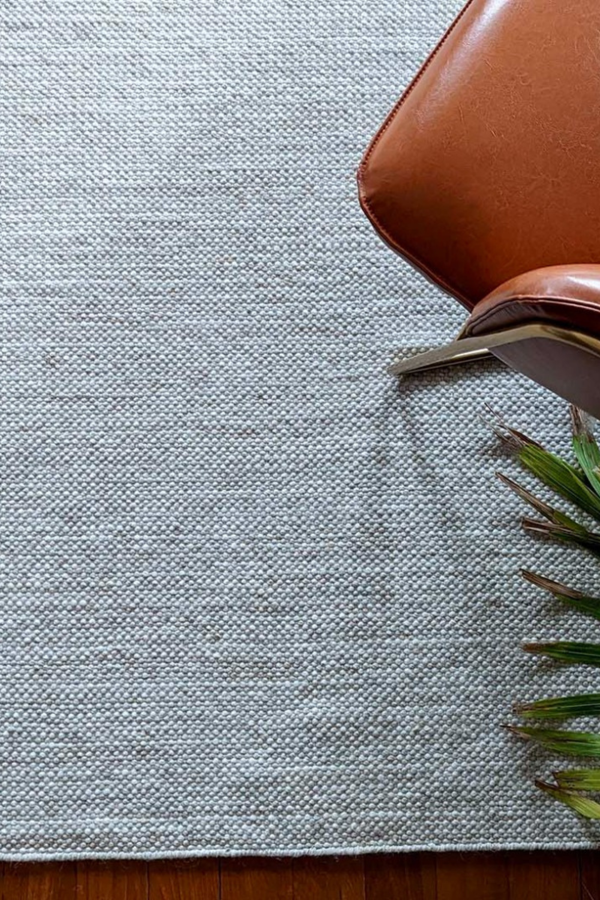 Simple beige textured area rug