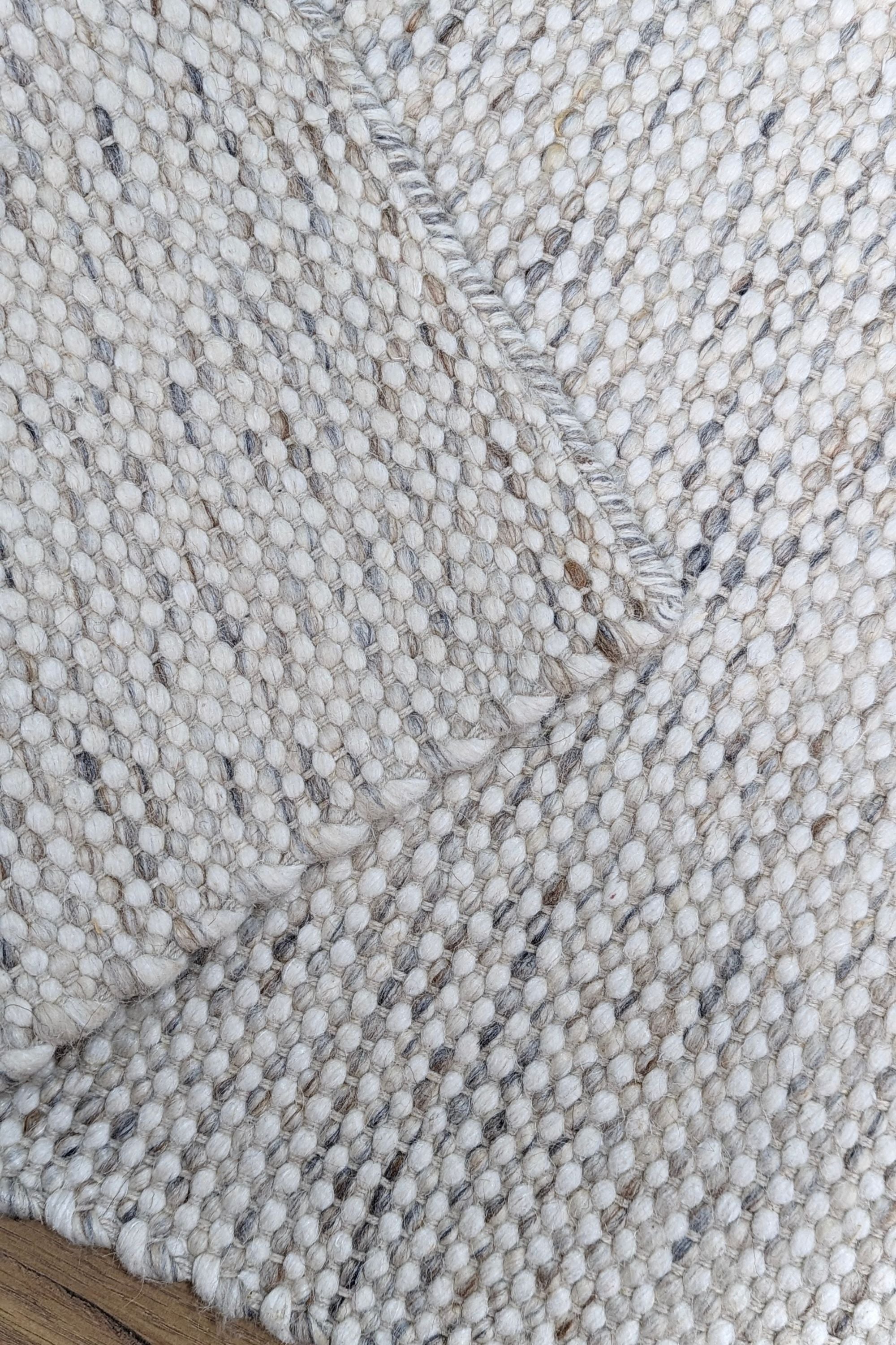 Grey textured area rug