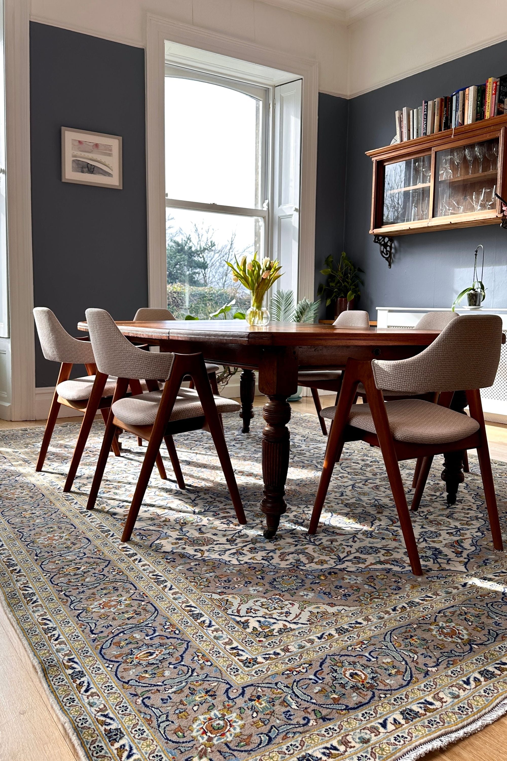 Authentic persian rug with traditional floral design in beige and blue