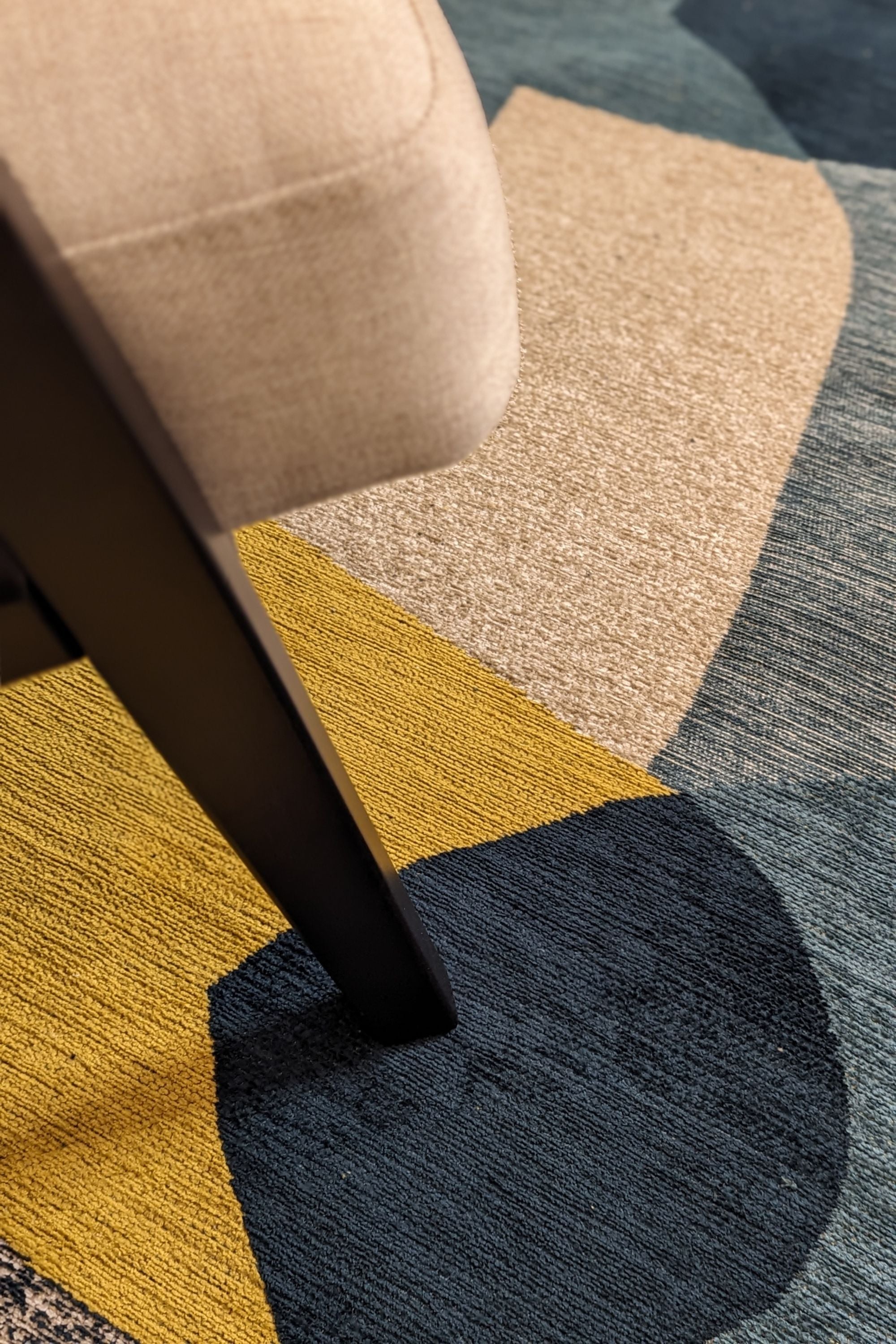 Modern rug with blue and yellow abstract pattern