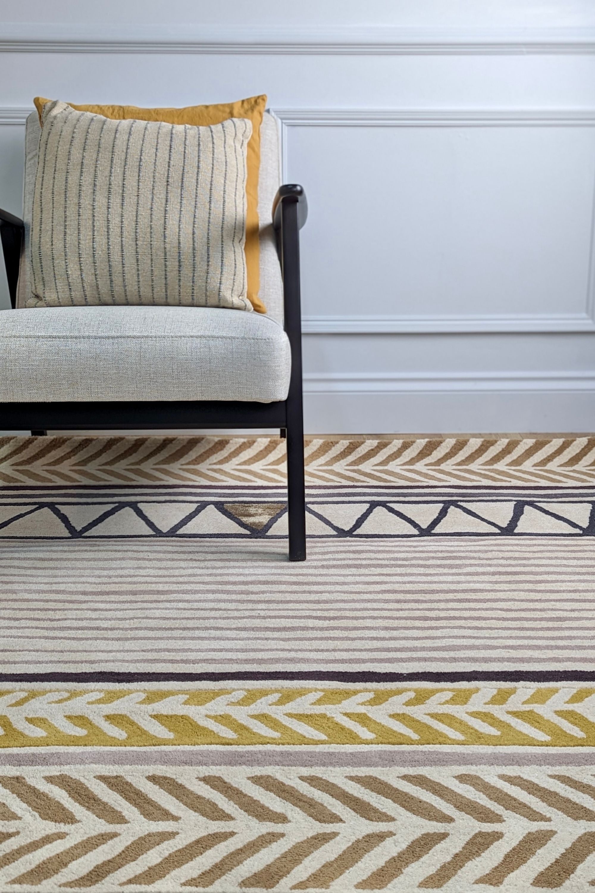 Quirky ethnic inspired pattern in yellow, taupe, cream and grey