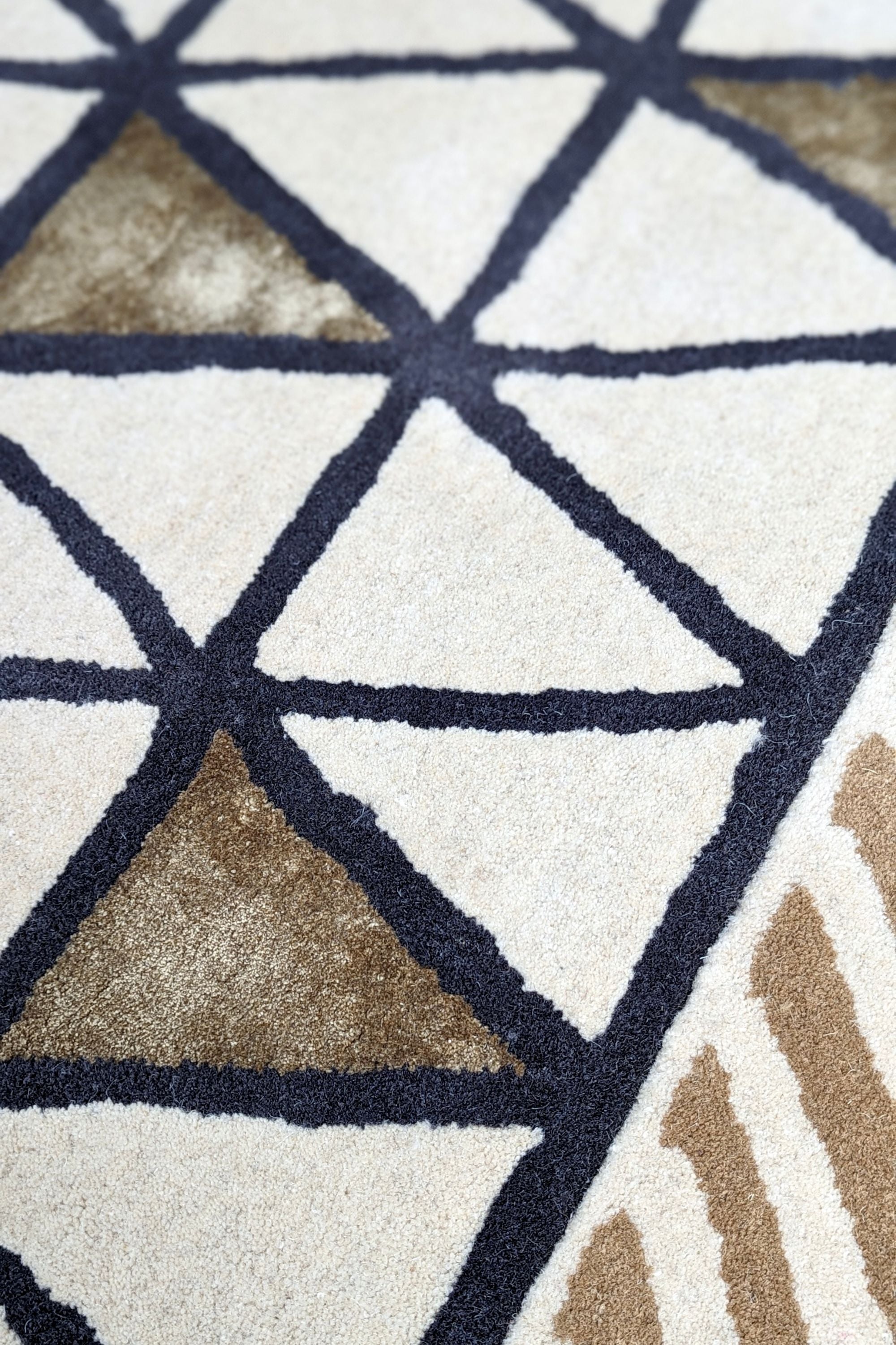 Quirky ethnic inspired pattern in yellow, taupe, cream and grey