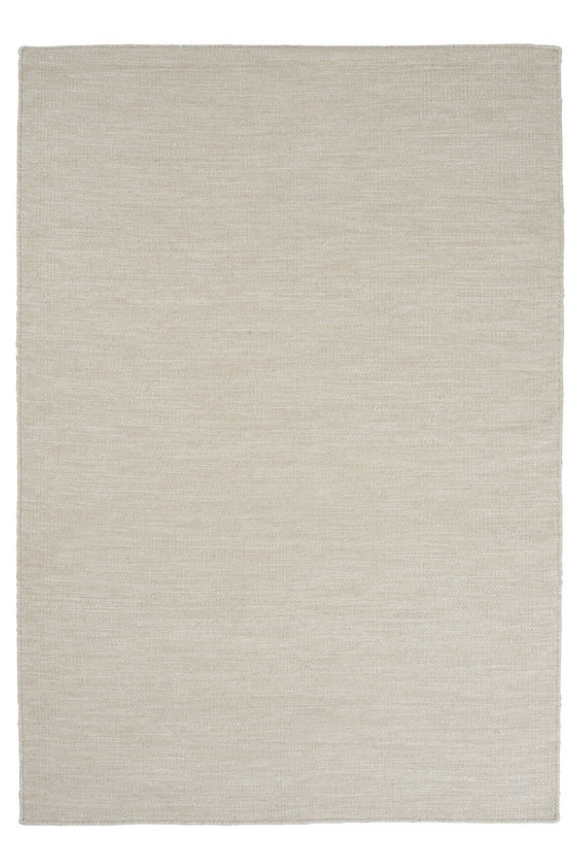 Plain beige wool rug