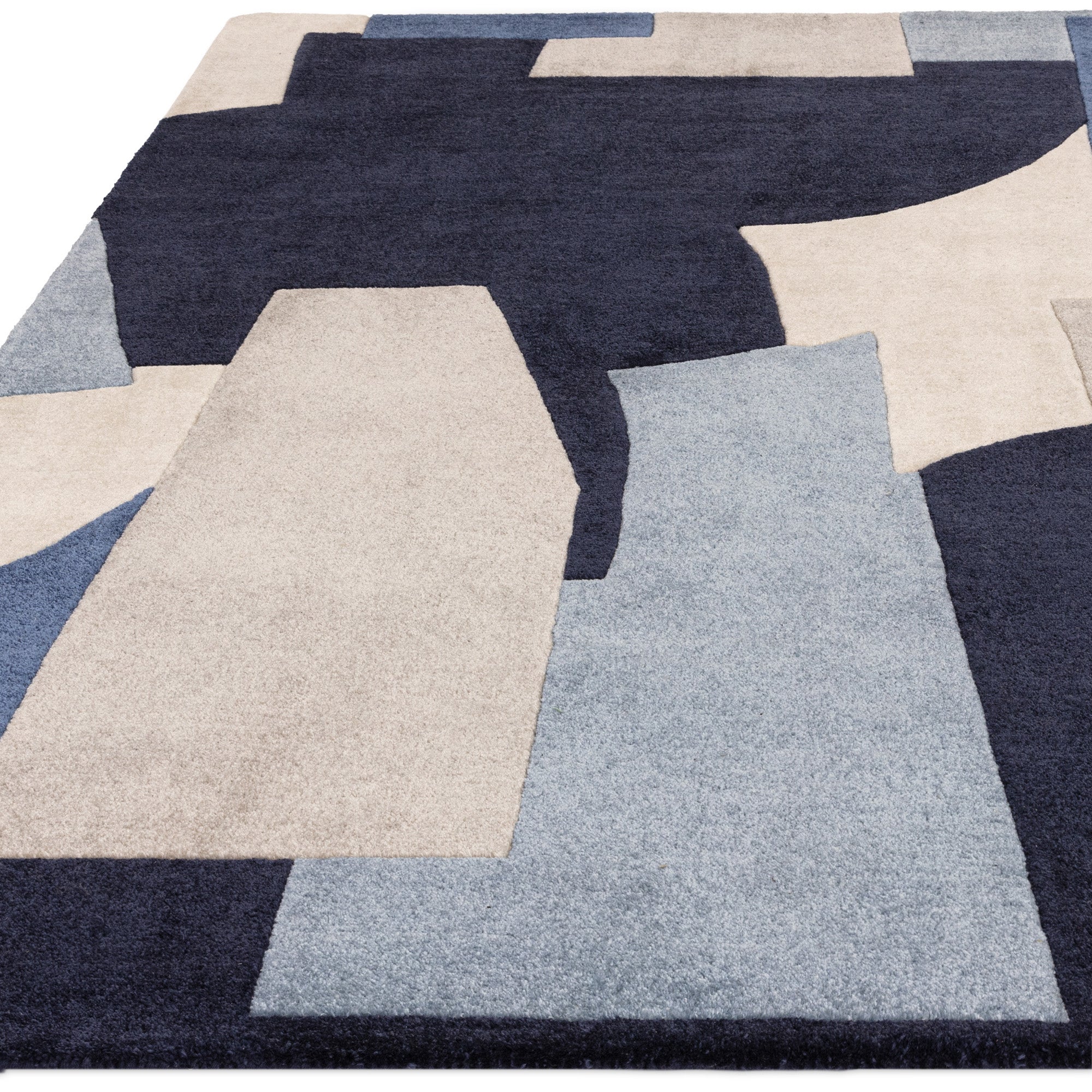 Multicolour rug with abstract pattern in blue, grey, and cream tones