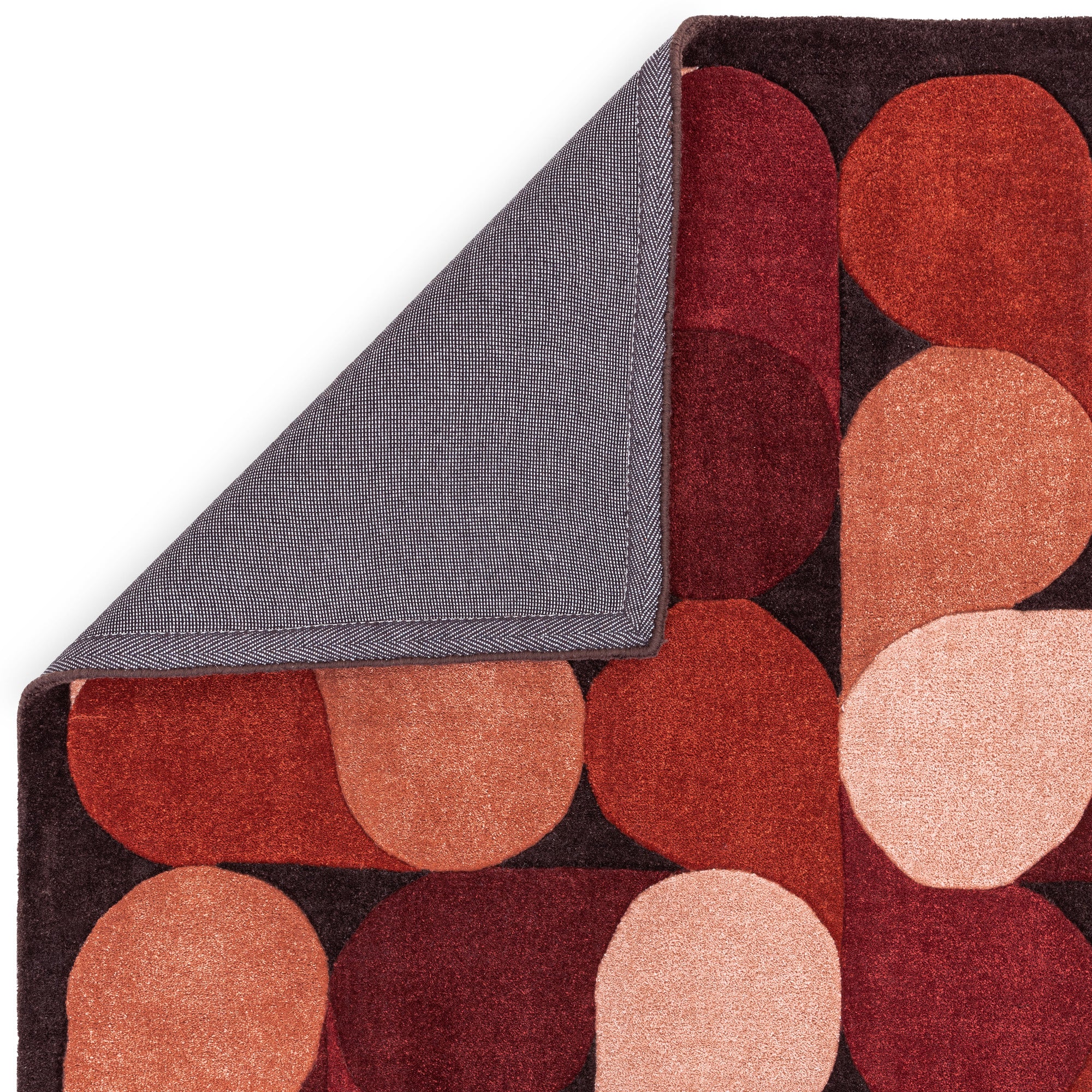 Red rug with an abstract pattern