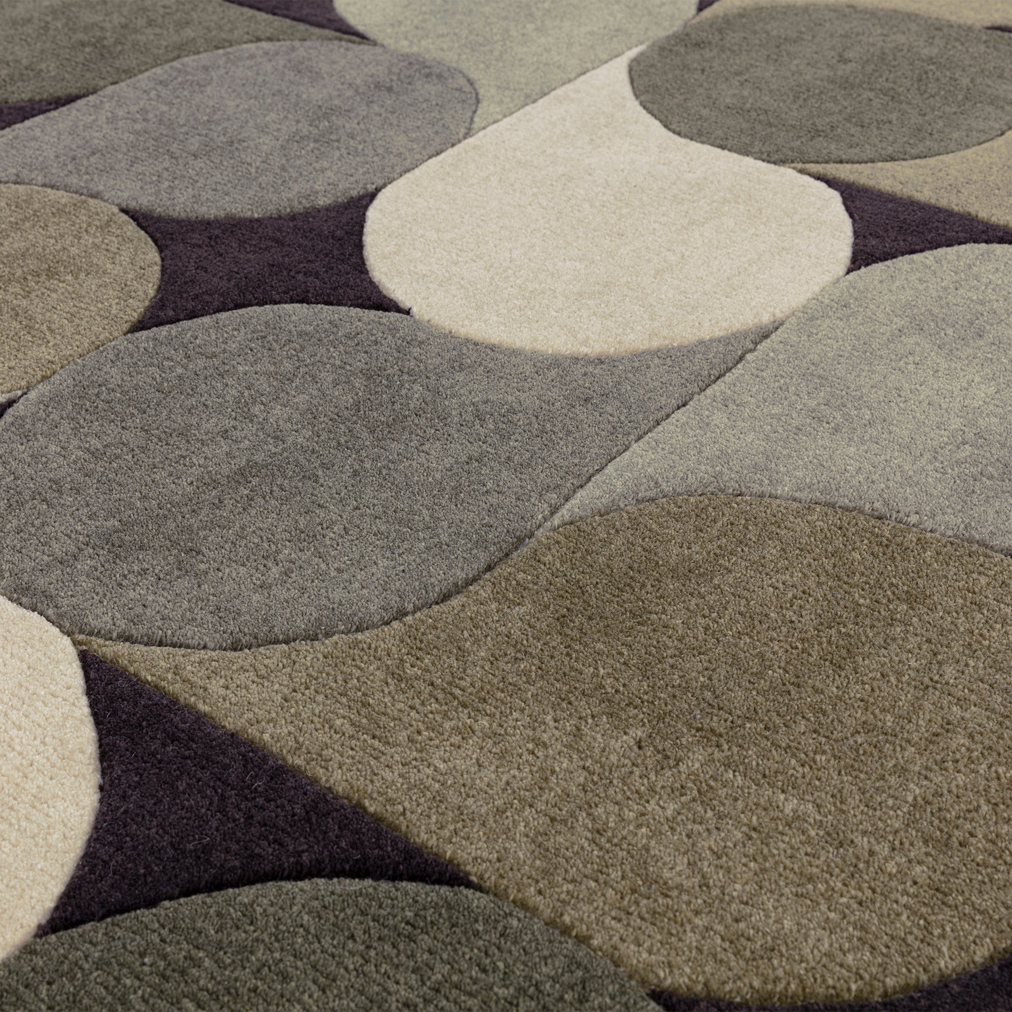 Green rug with an abstract pattern