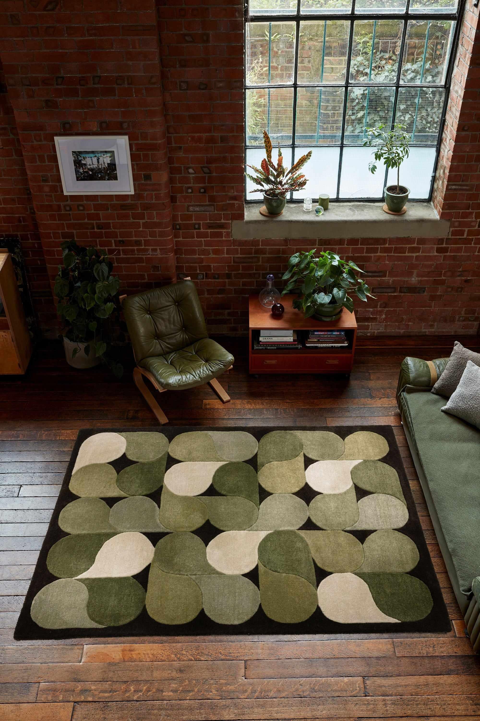 Green rug with an abstract pattern