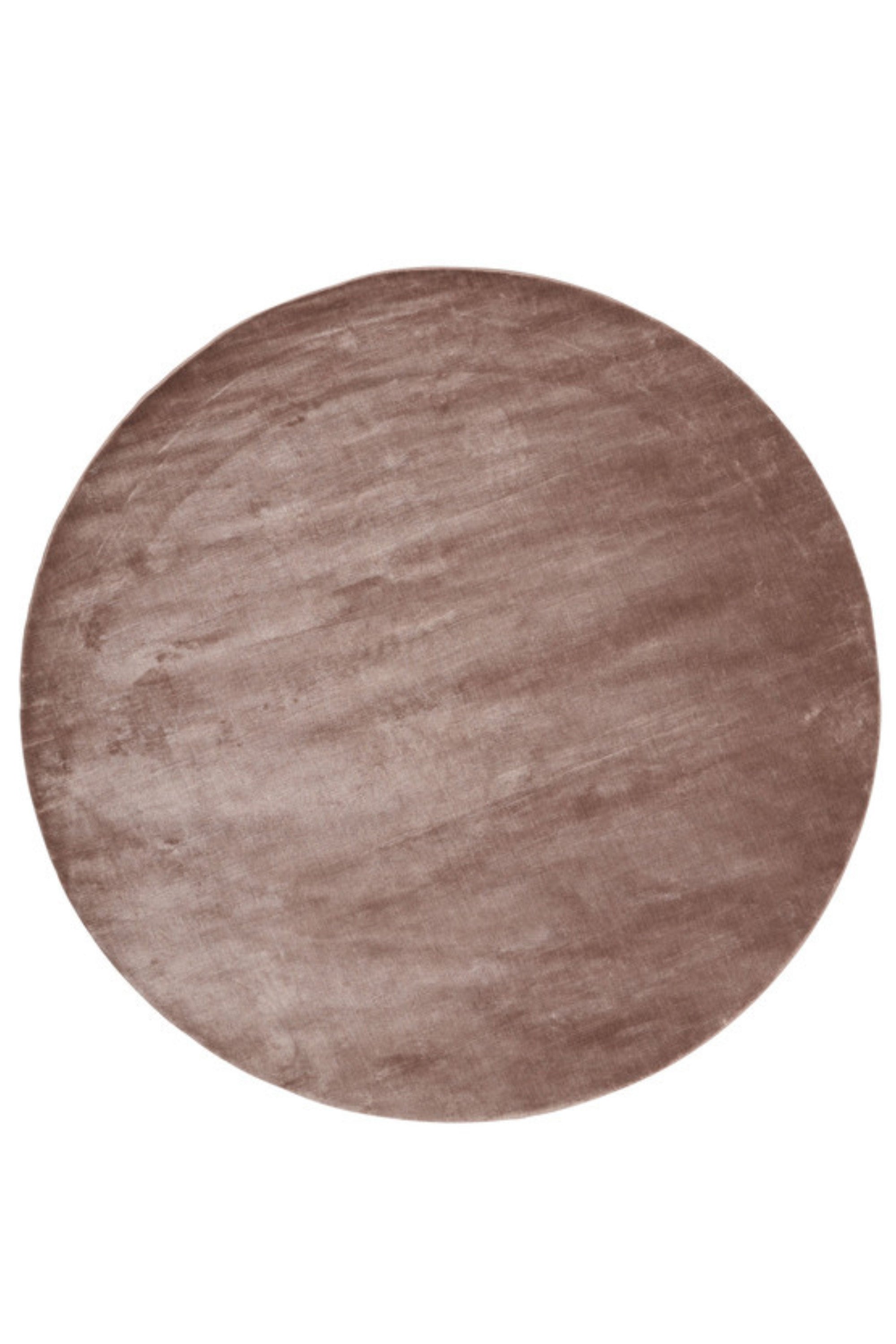 Plain round pink viscose rug