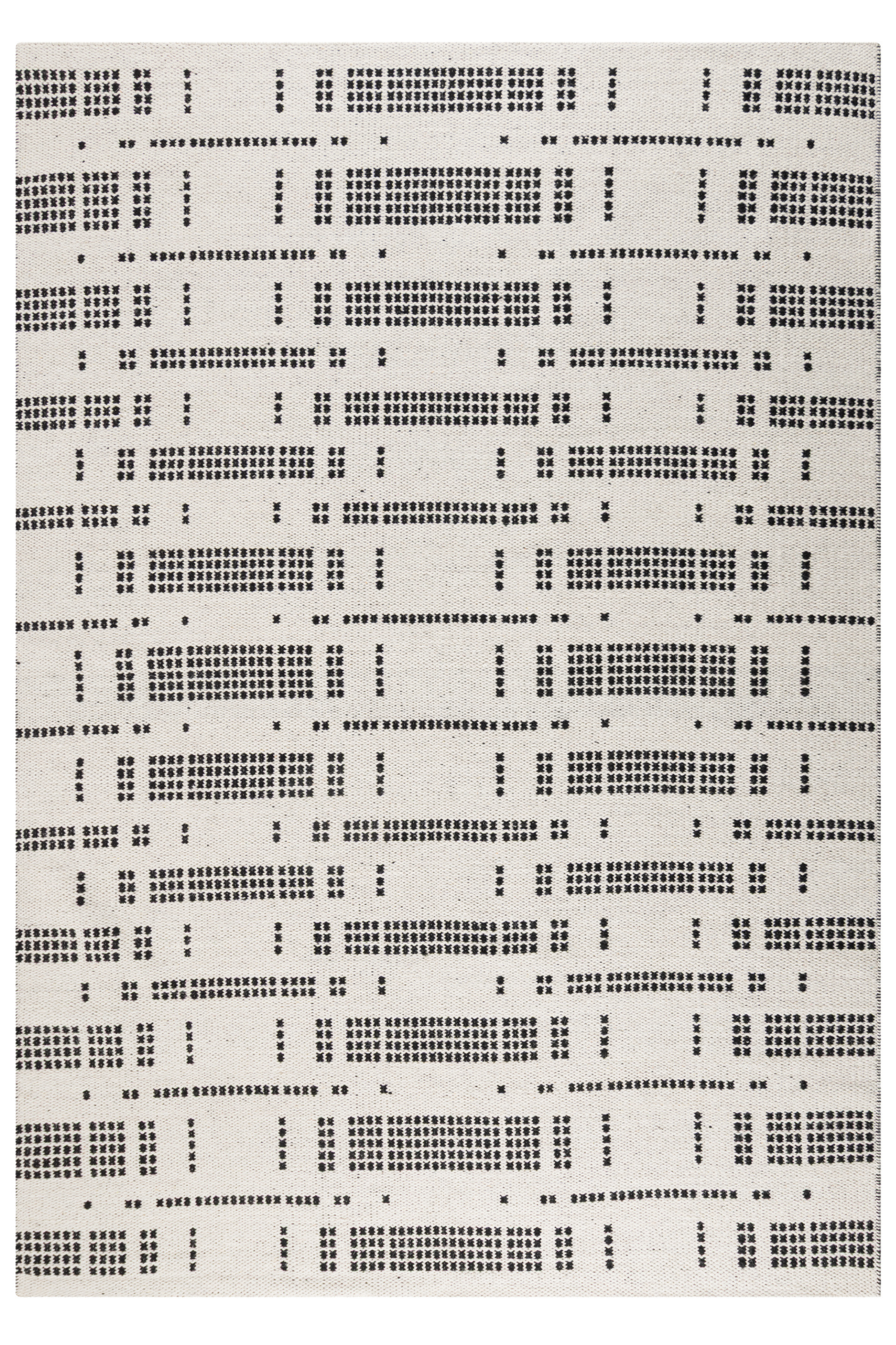 White wool and cotton rug with a black geometric pattern inspired by the Manhattan skyline at night