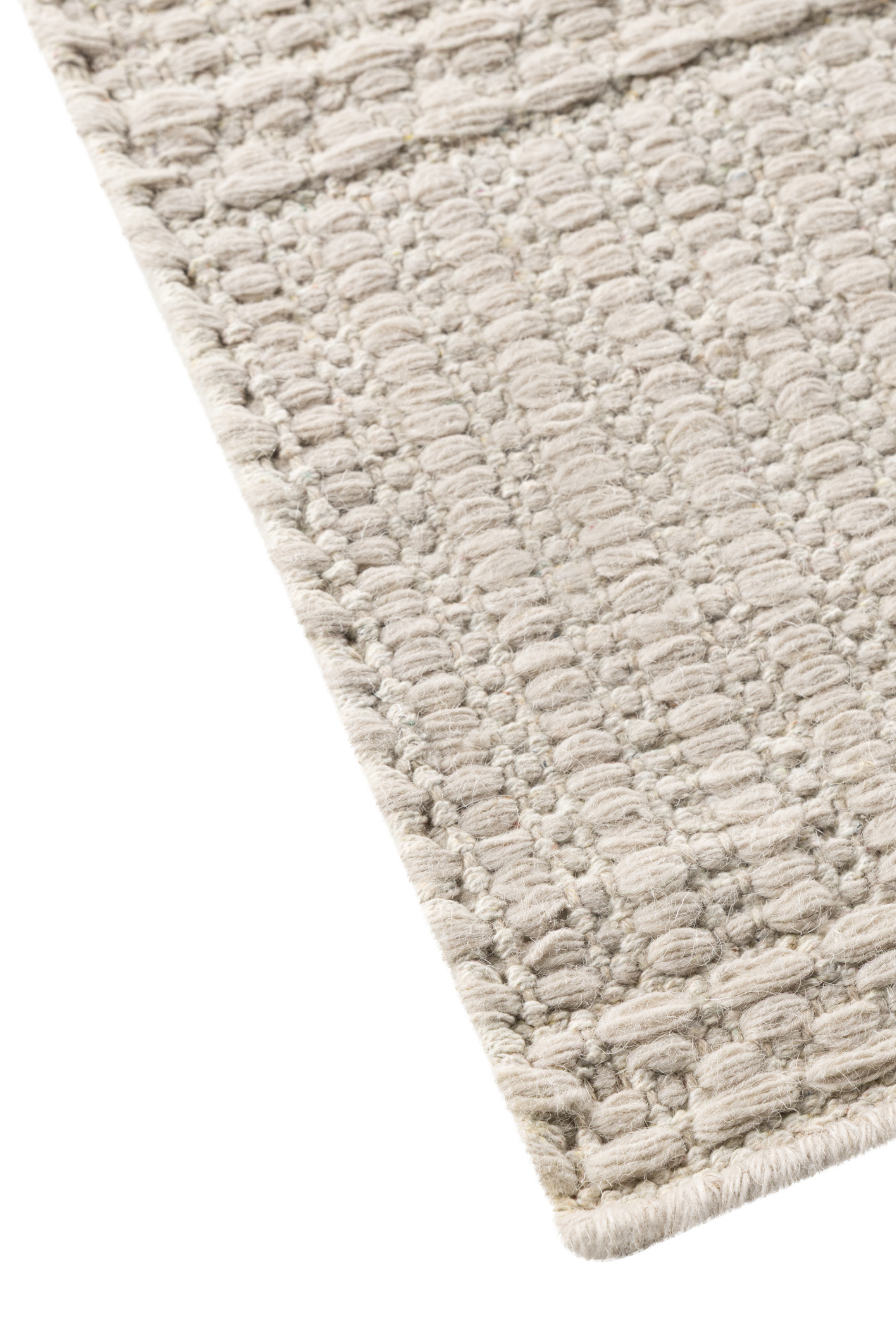 beige wool and cotton runner rug featuring a design inspired by ancient irish script