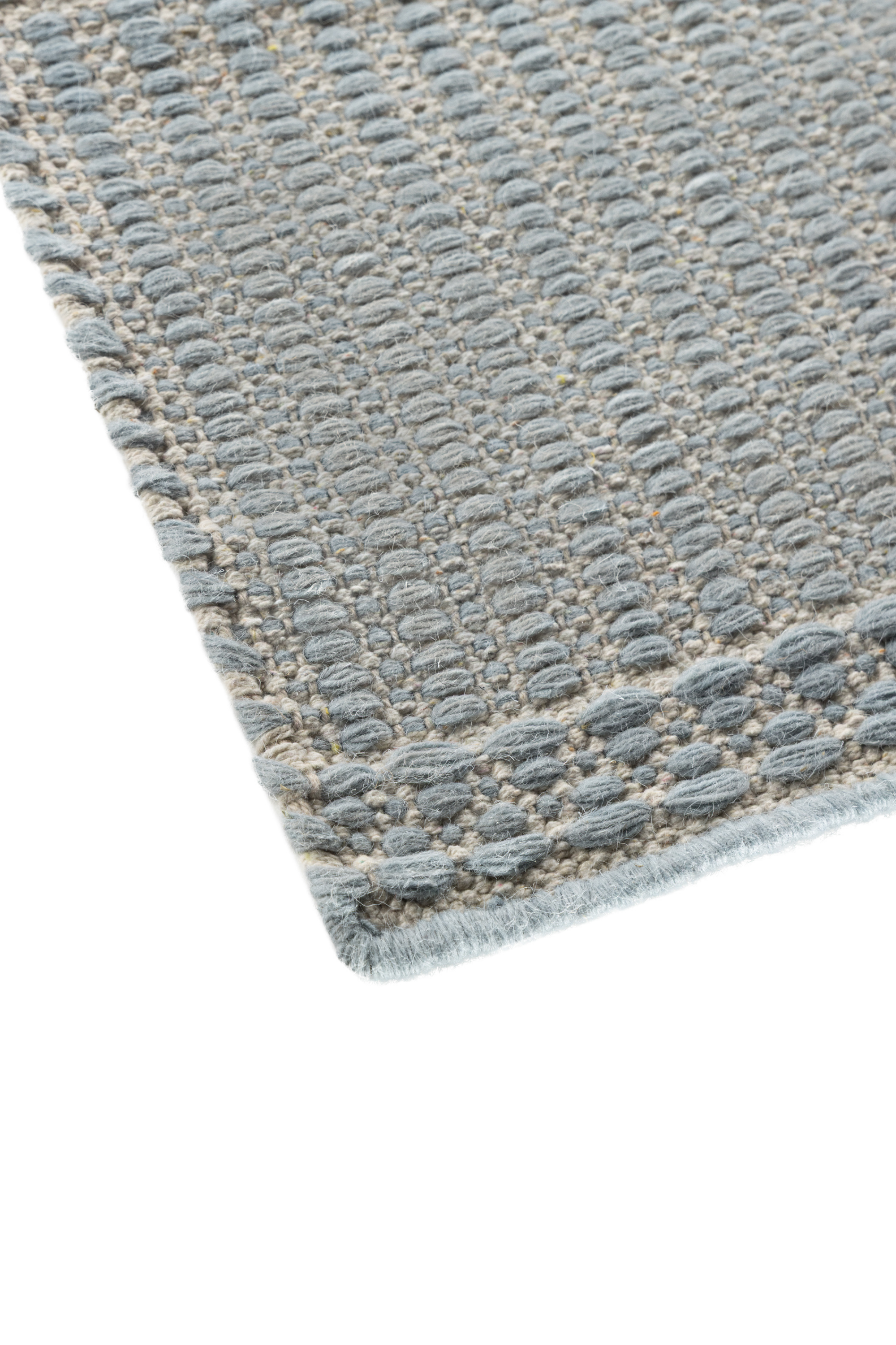 Blue wool and cotton runner rug featuring a design inspired by ancient irish script