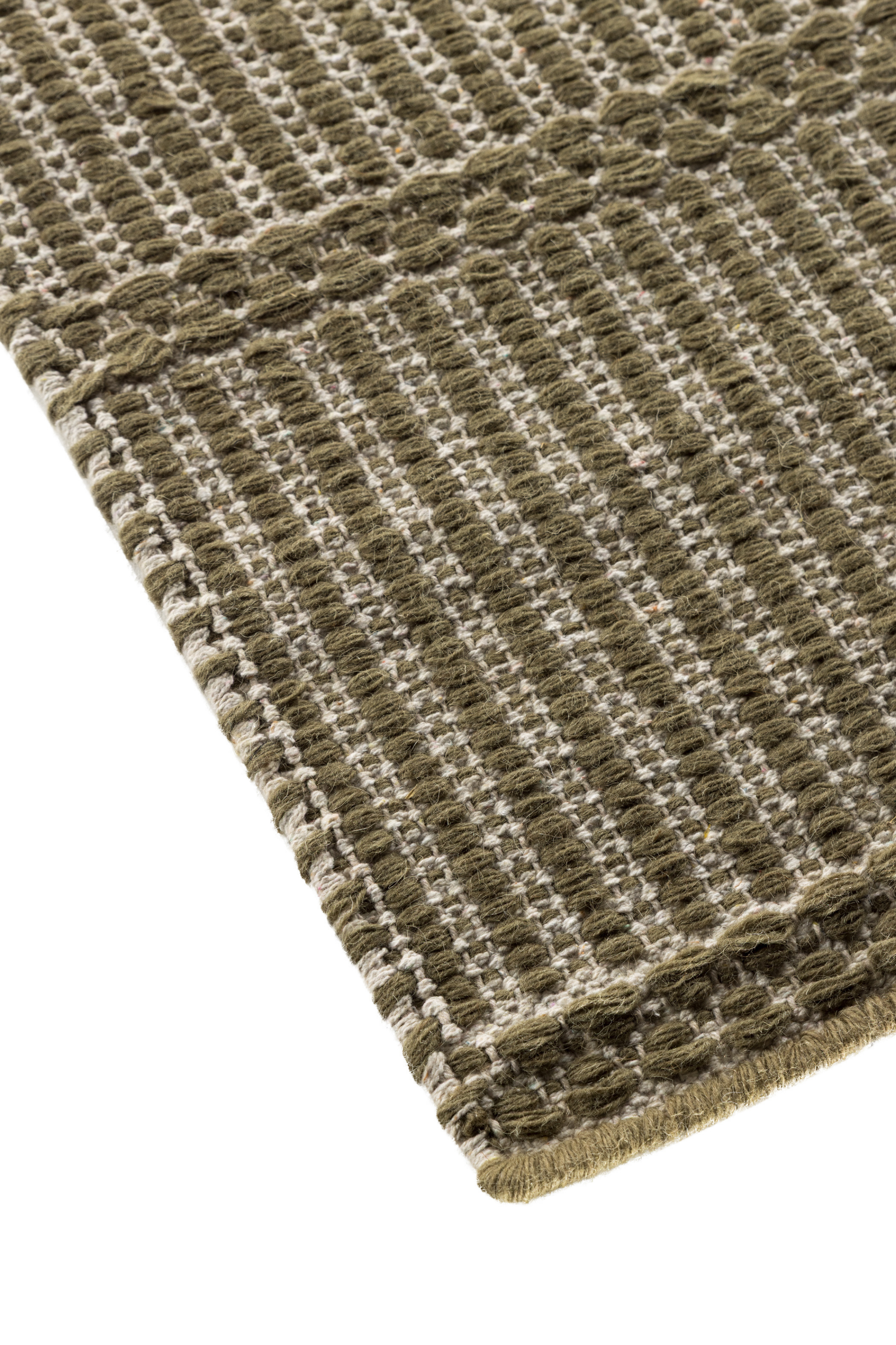 wool and cotton runner rug in dark green moss tones featuring a design inspired by ancient irish script