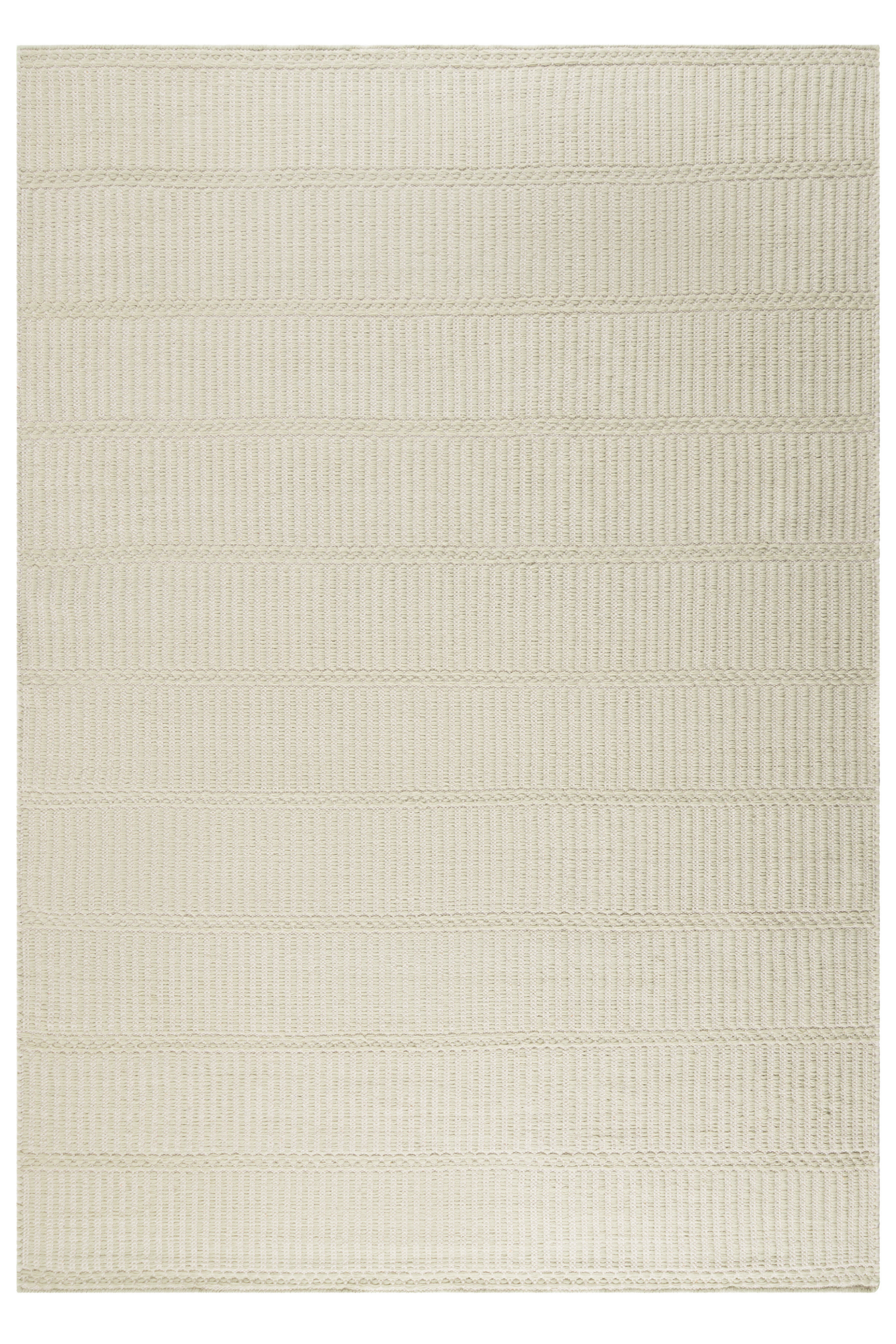 wool and cotton rug in soft olive hues featuring a design inspired by ancient irish script