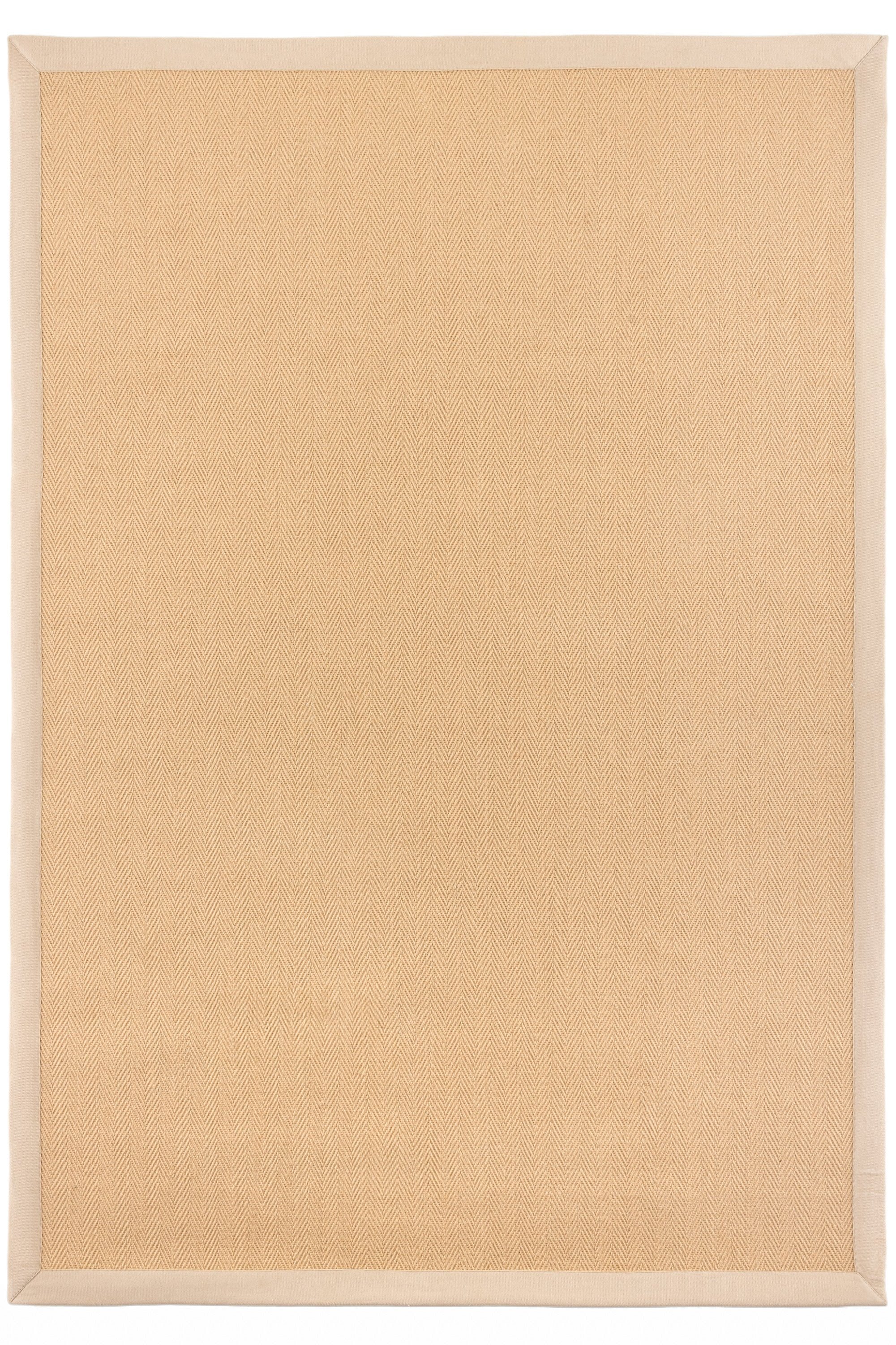 Sisal rug with herringbone pattern and beige linen border