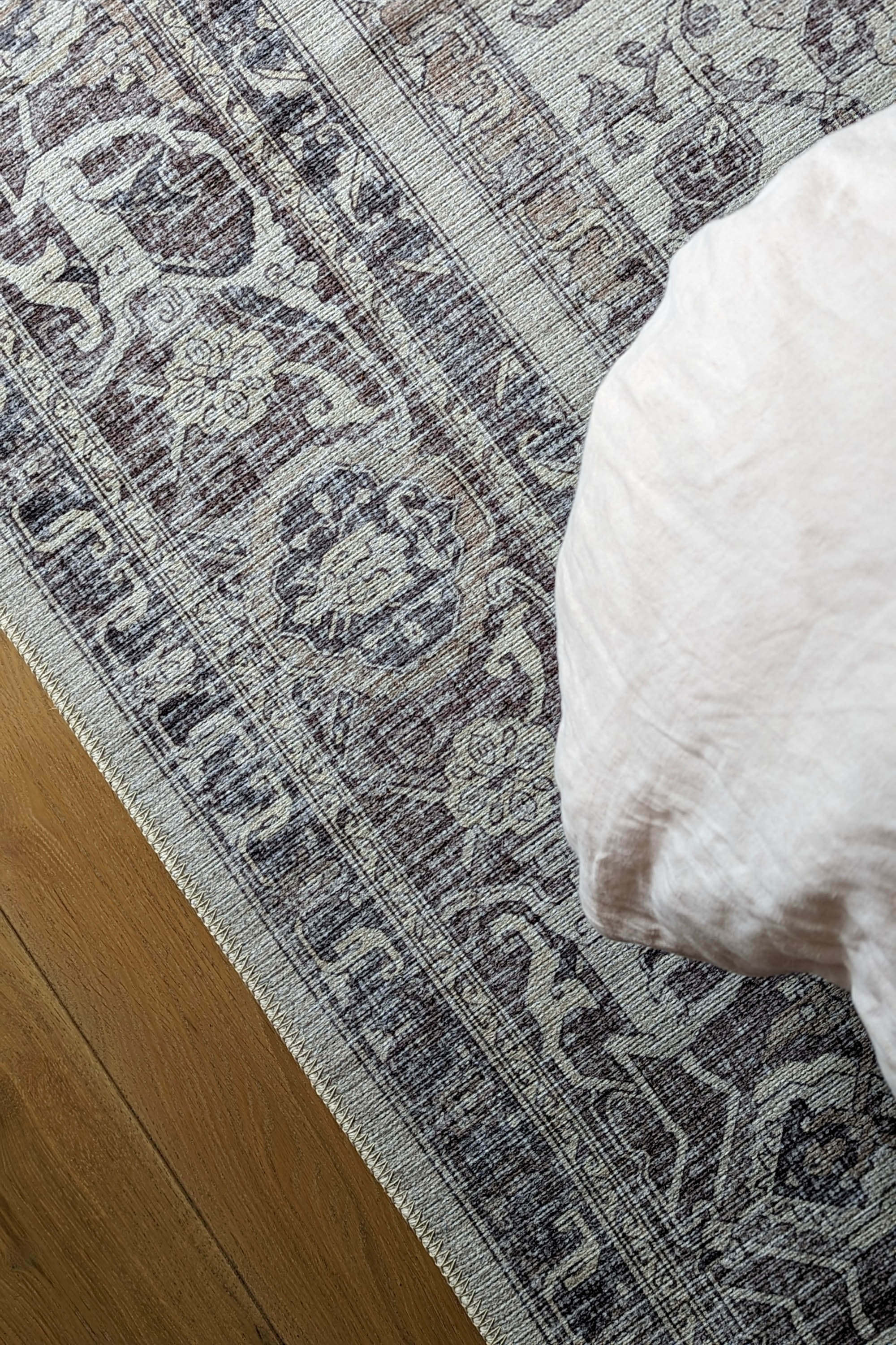 Bordered grey vintage style rug