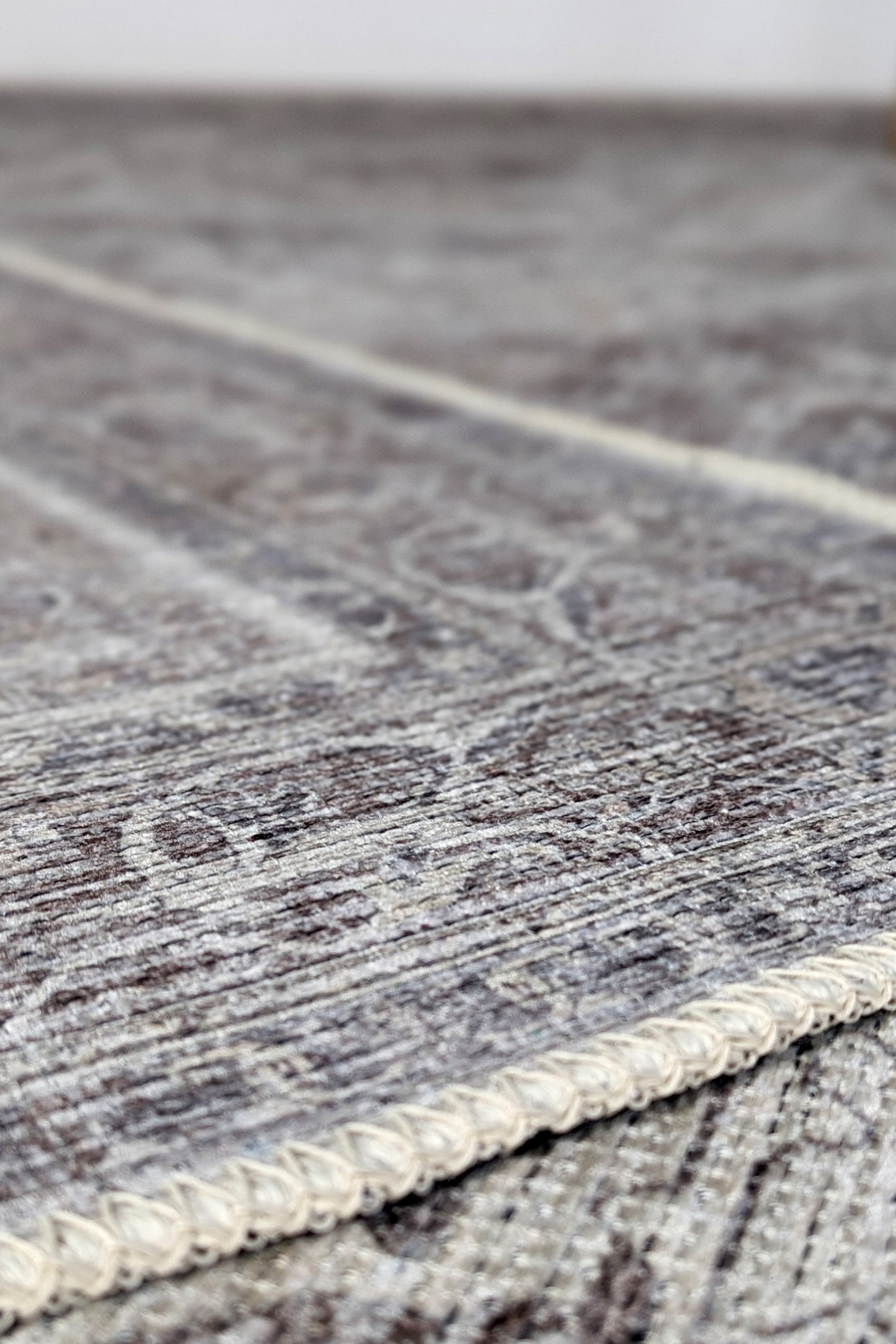 Bordered grey vintage style rug