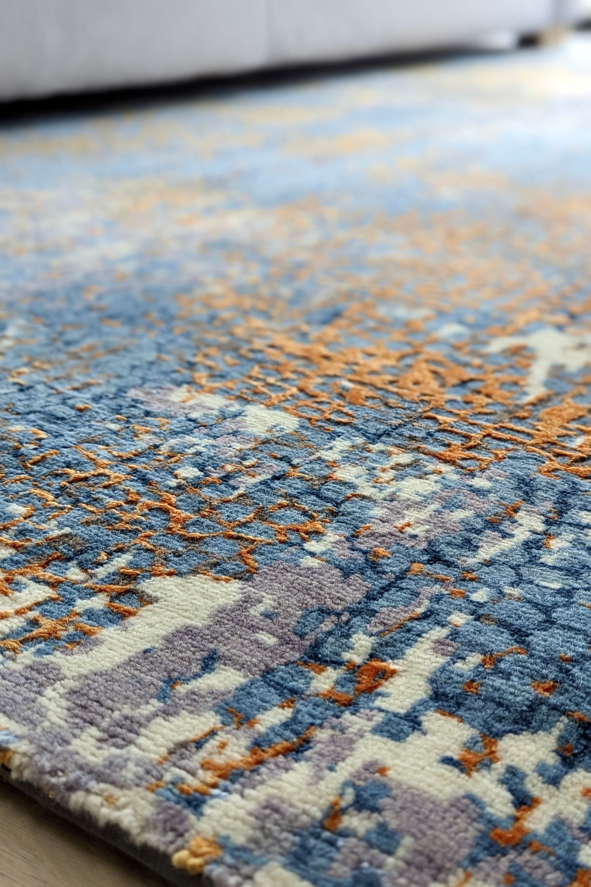 Abstract blue, orange, purple and white wool rug