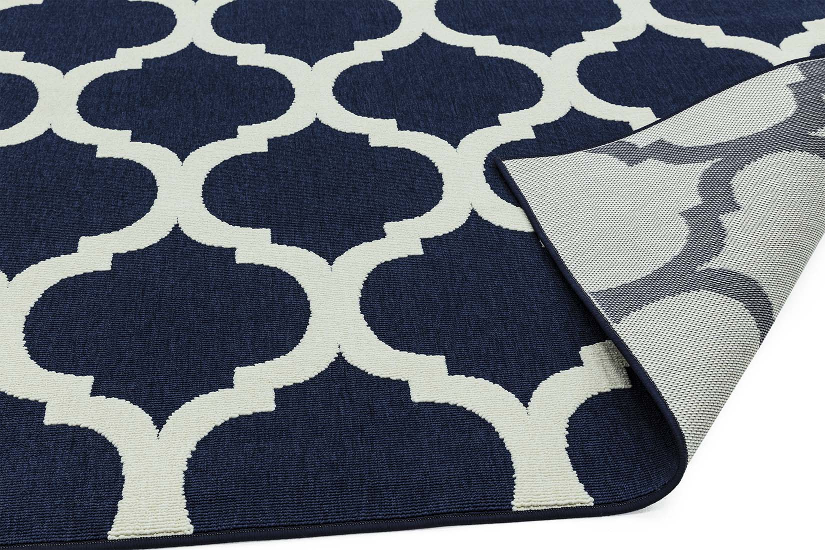navy indoor/outdoor rug with trellis design
