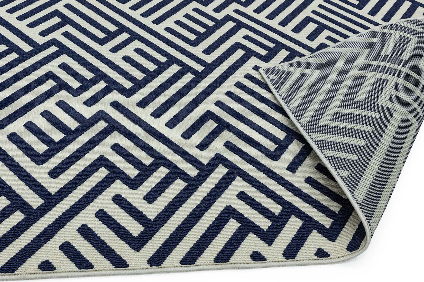 geometric indoor/outdoor rug in blue and white
