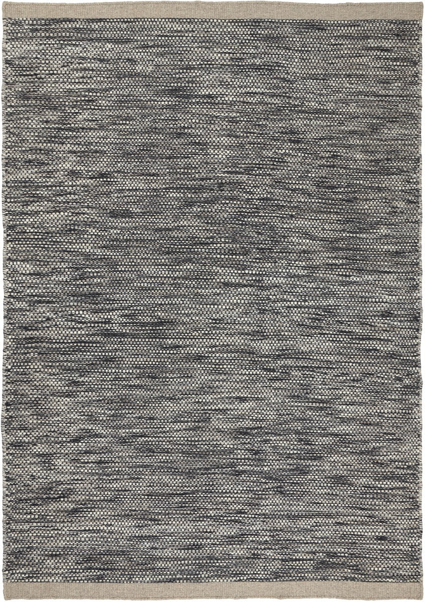 plain black and beige wool rug
