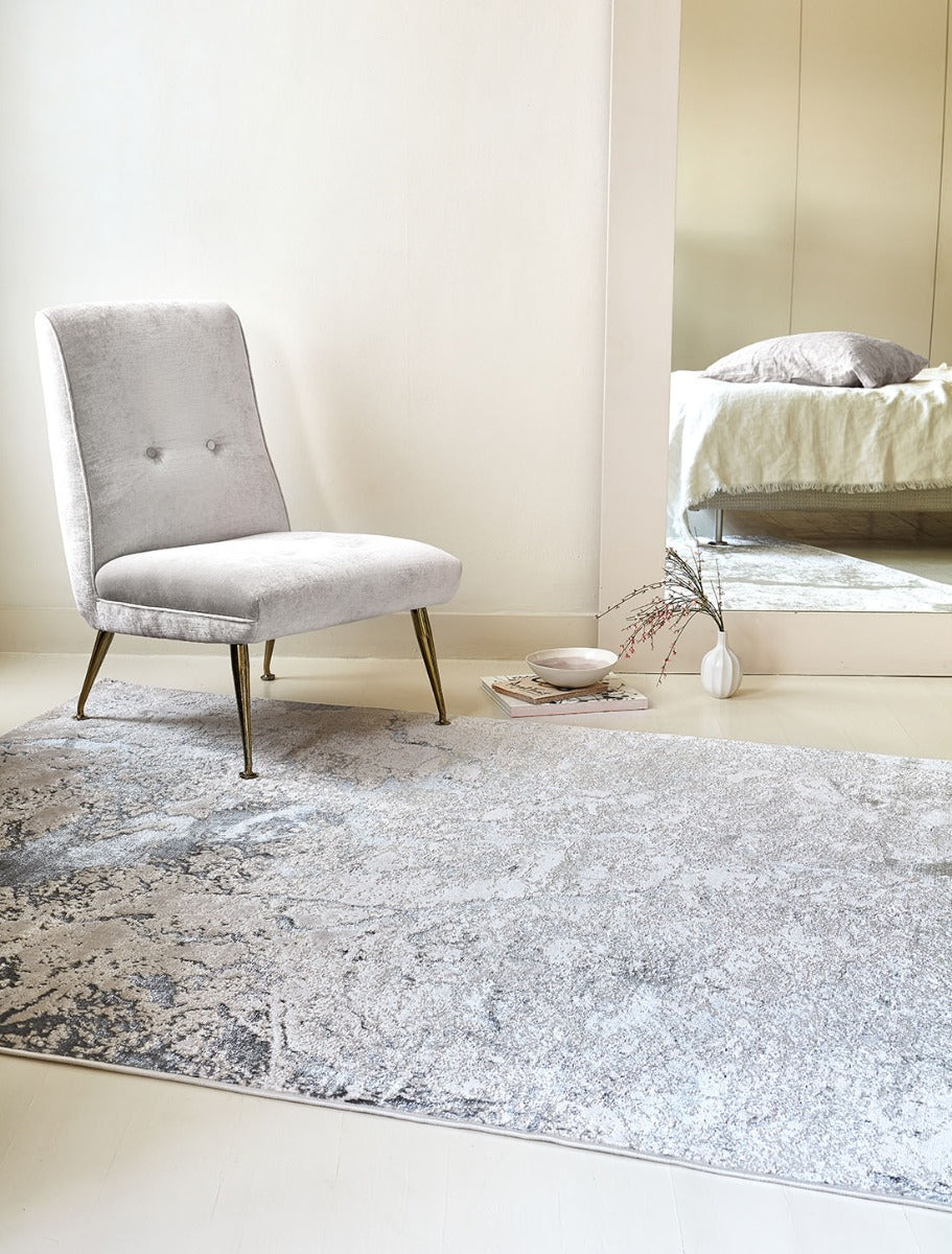 grey abstract rug with a marble design