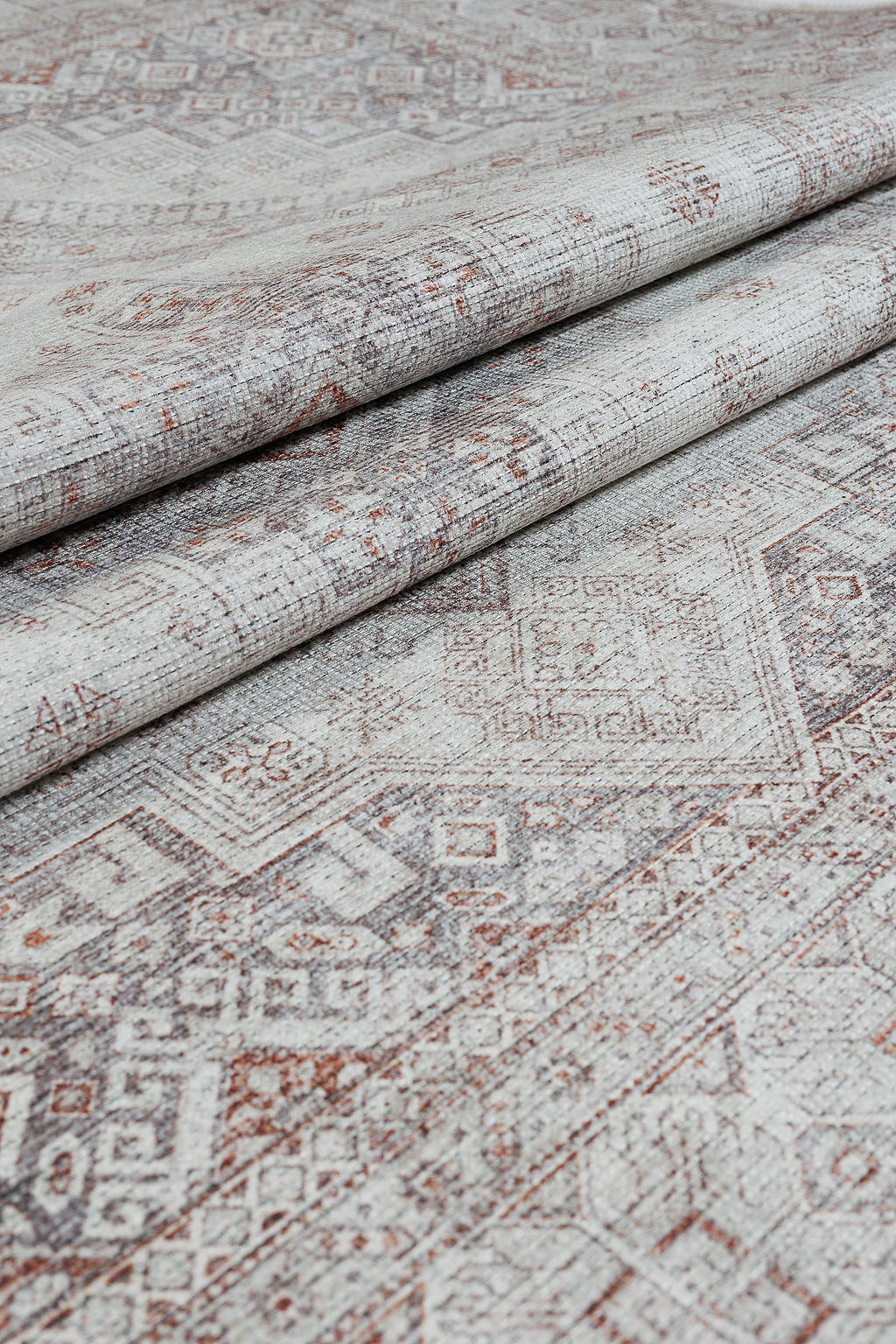 Grey bordered vintage style rug