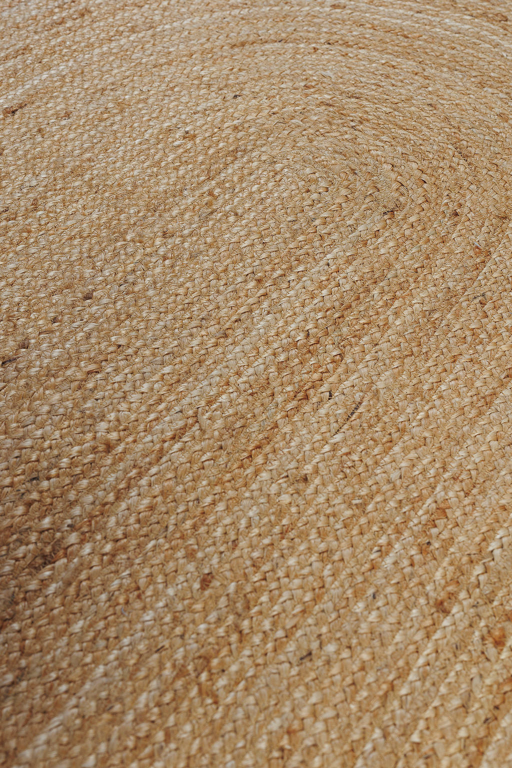 Brown oval jute rug