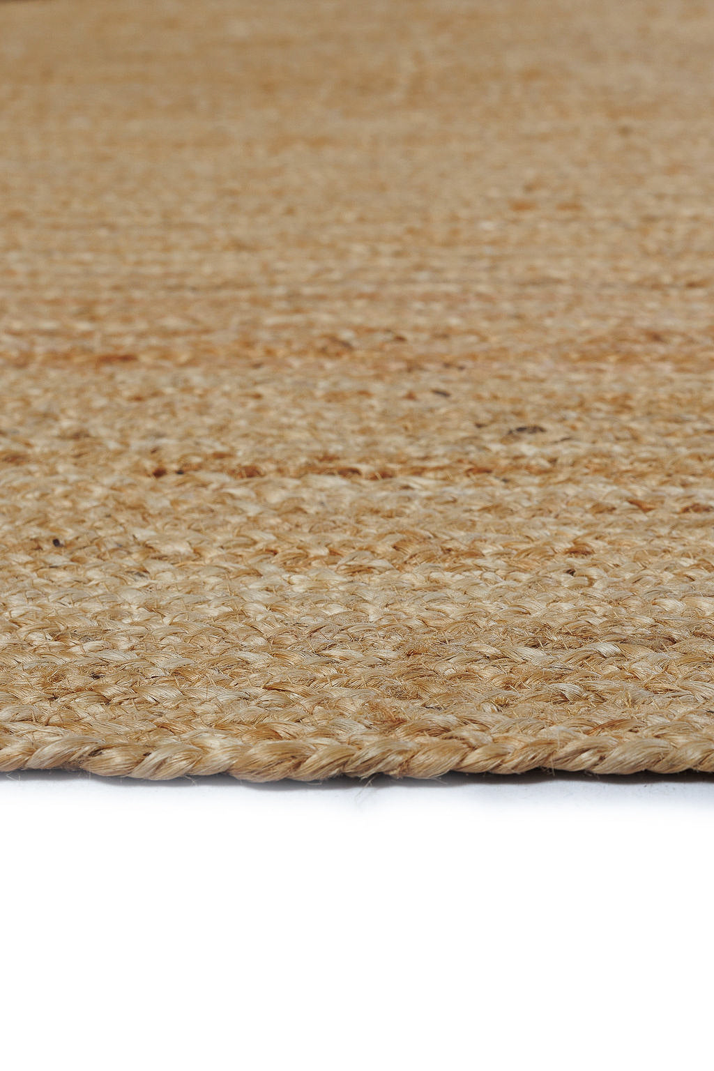 Brown oval jute rug