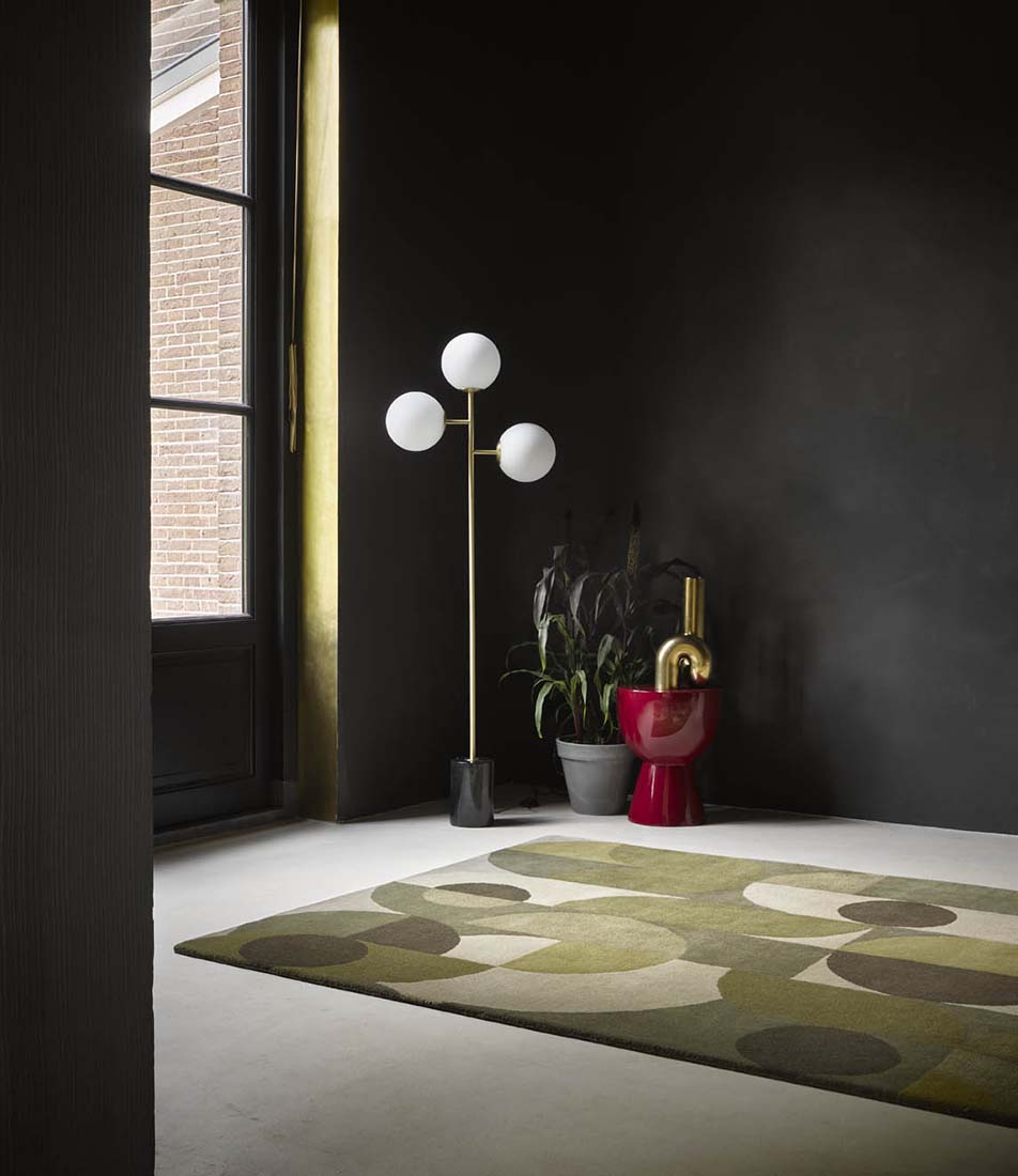 green wool area rug with retro design