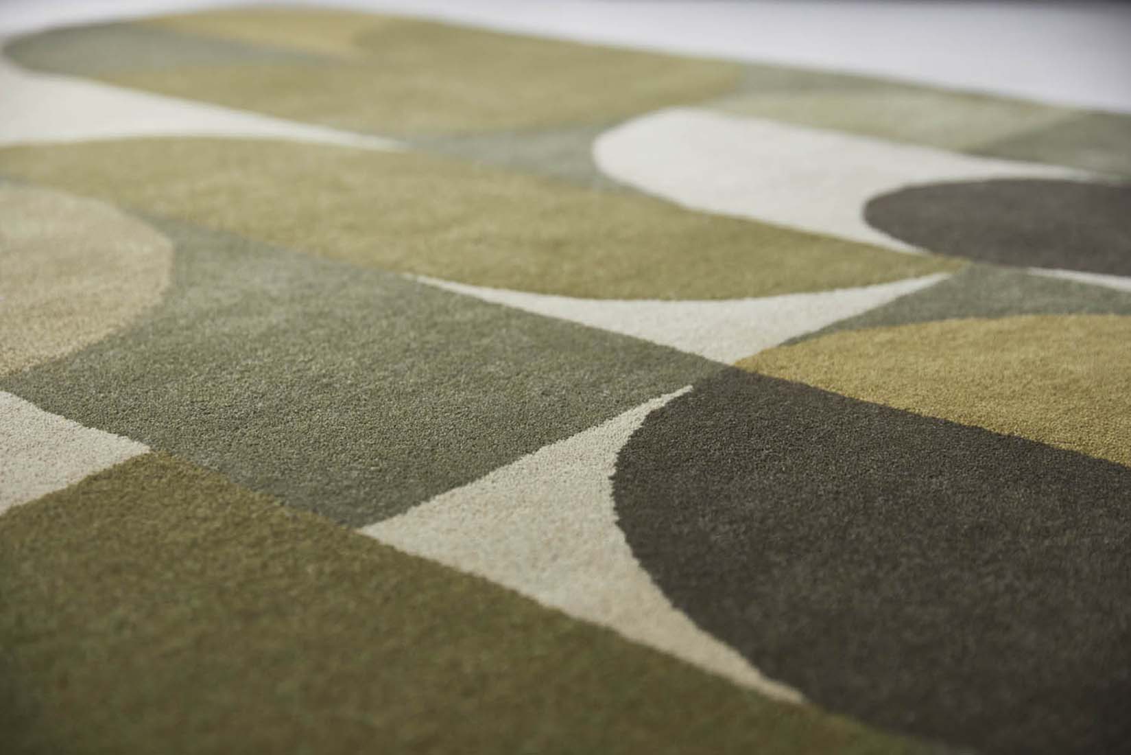 green wool area rug with retro design