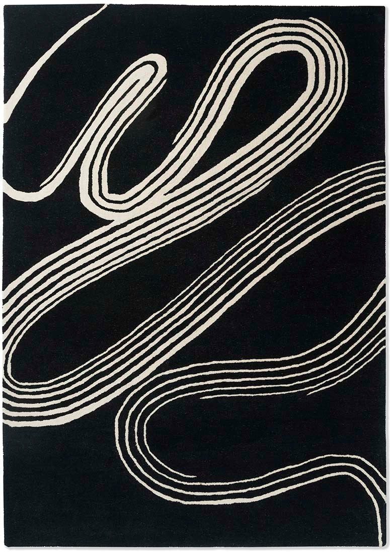 black rug with cream brush strokes