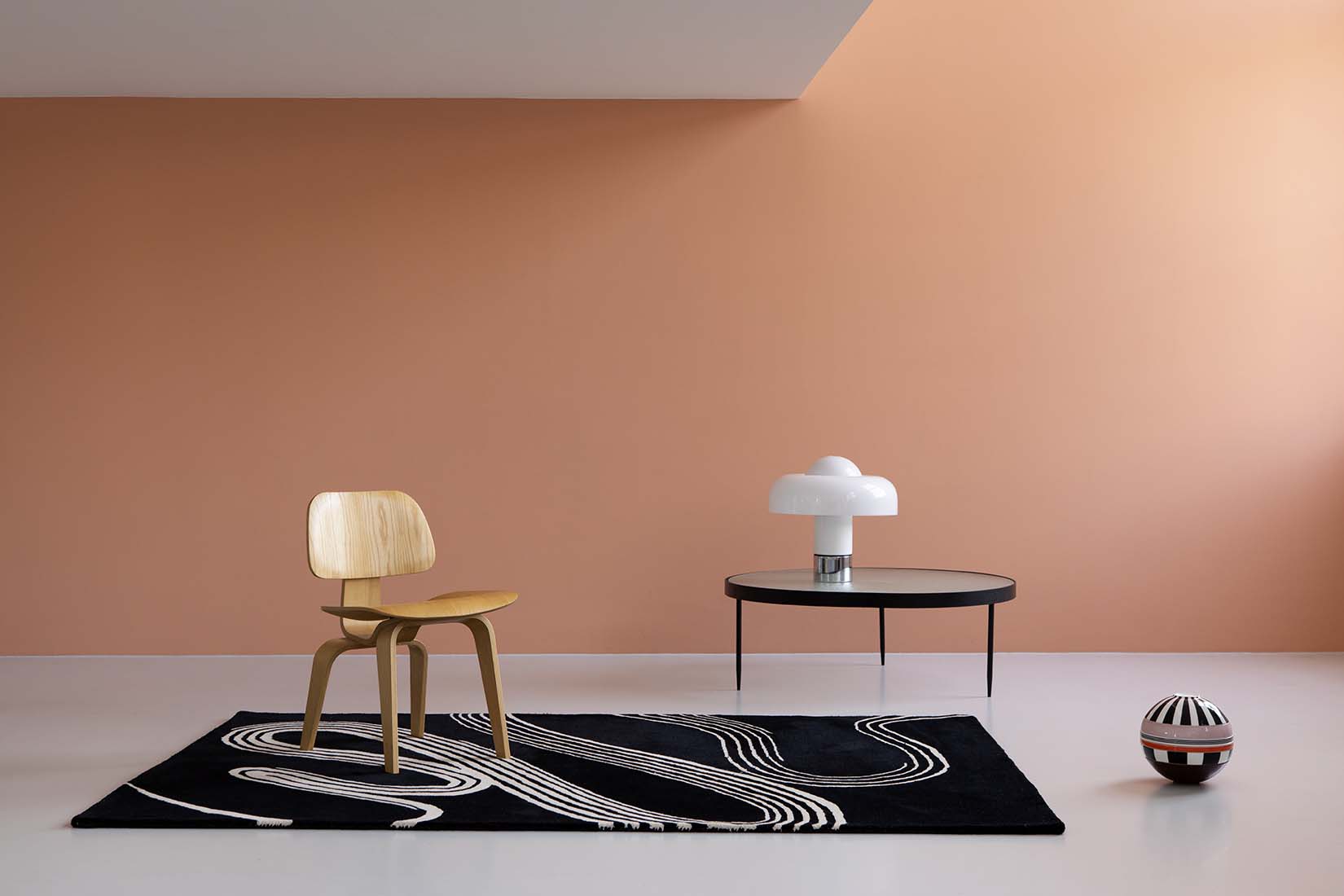 black rug with cream brush strokes