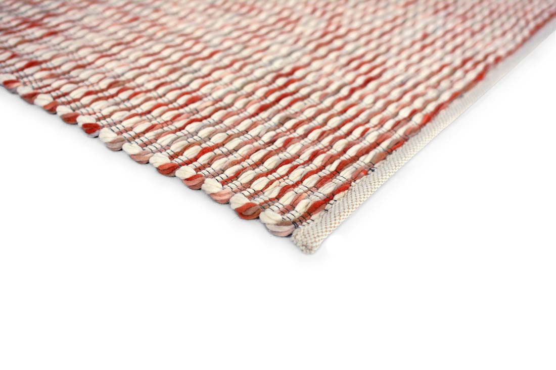 red and pink textured area rug
