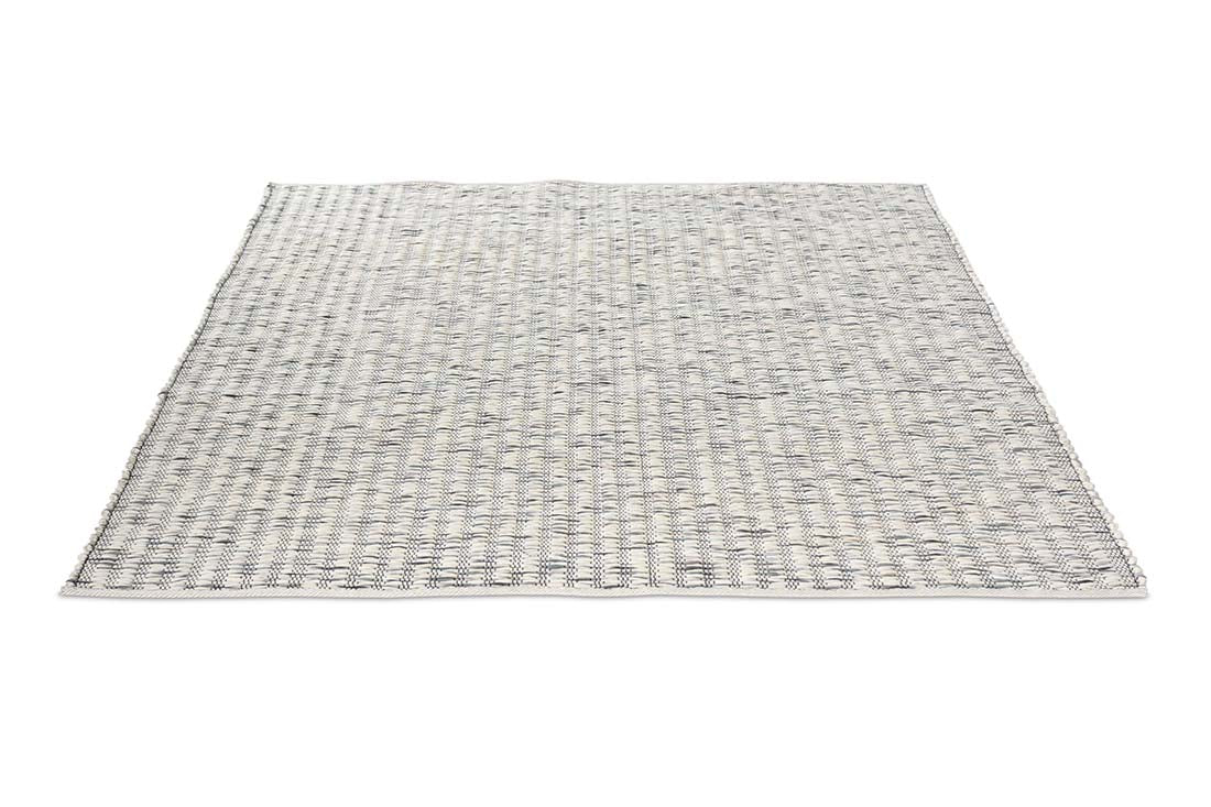 cream and grey textured area rug