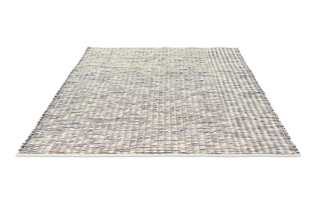 cream and grey textured area rug 
