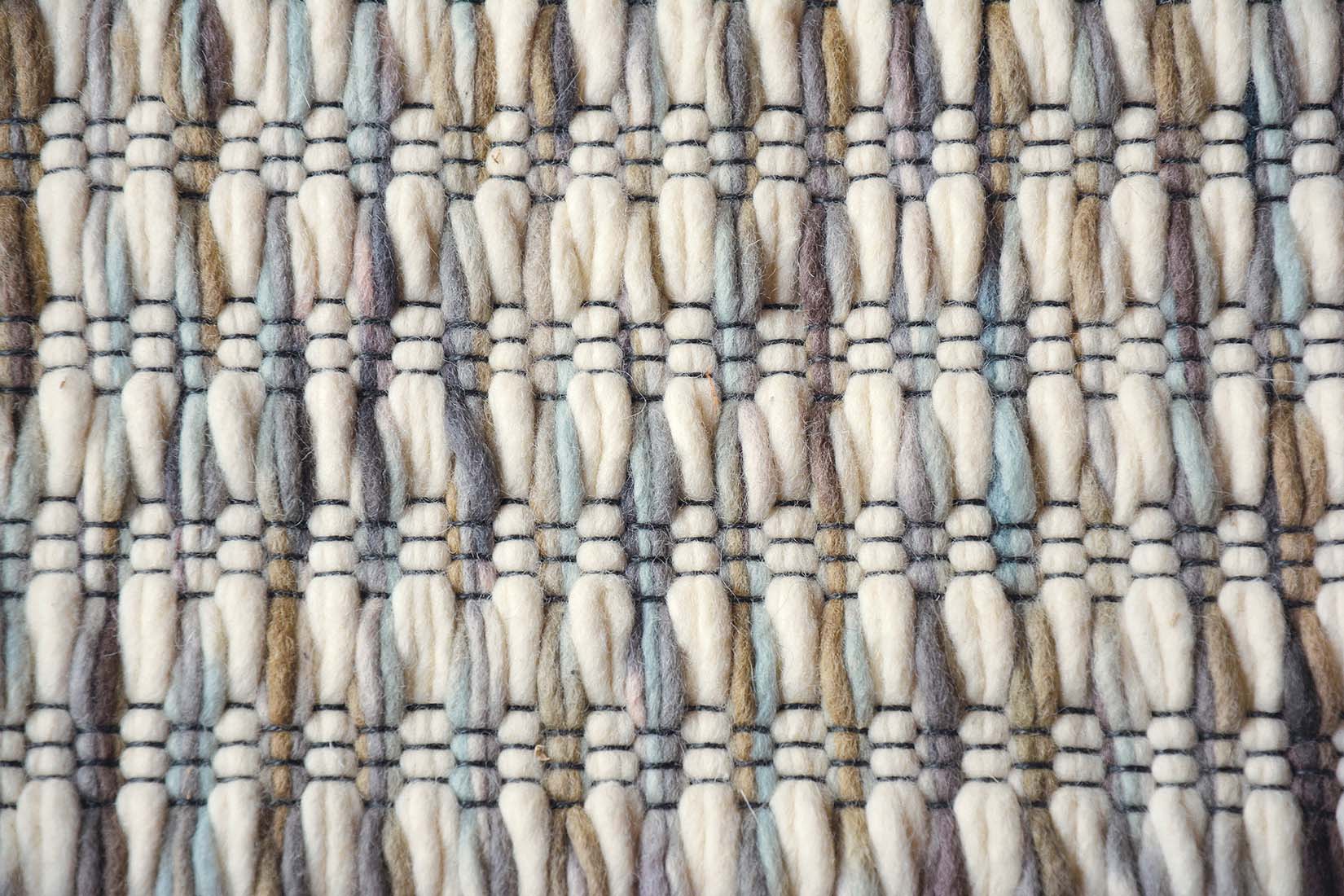 cream and grey textured area rug