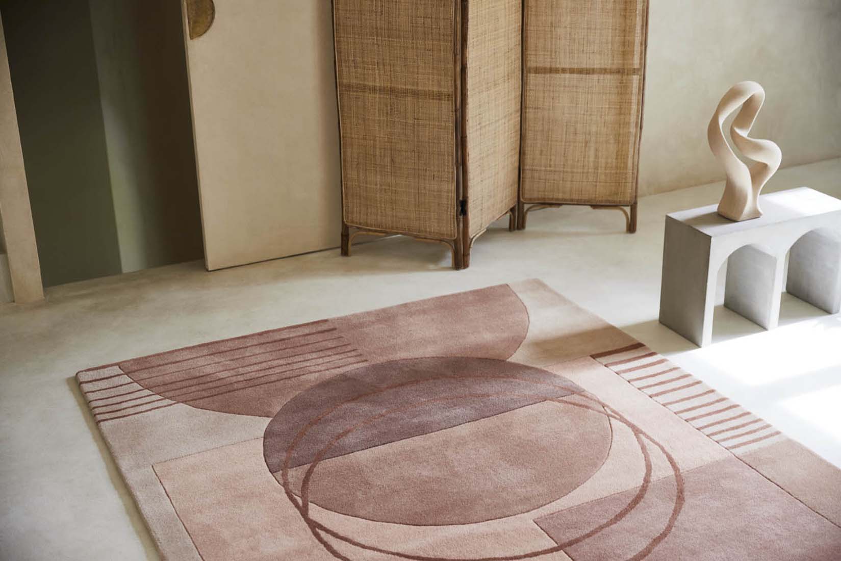 pink wool area rug with modern geometric design