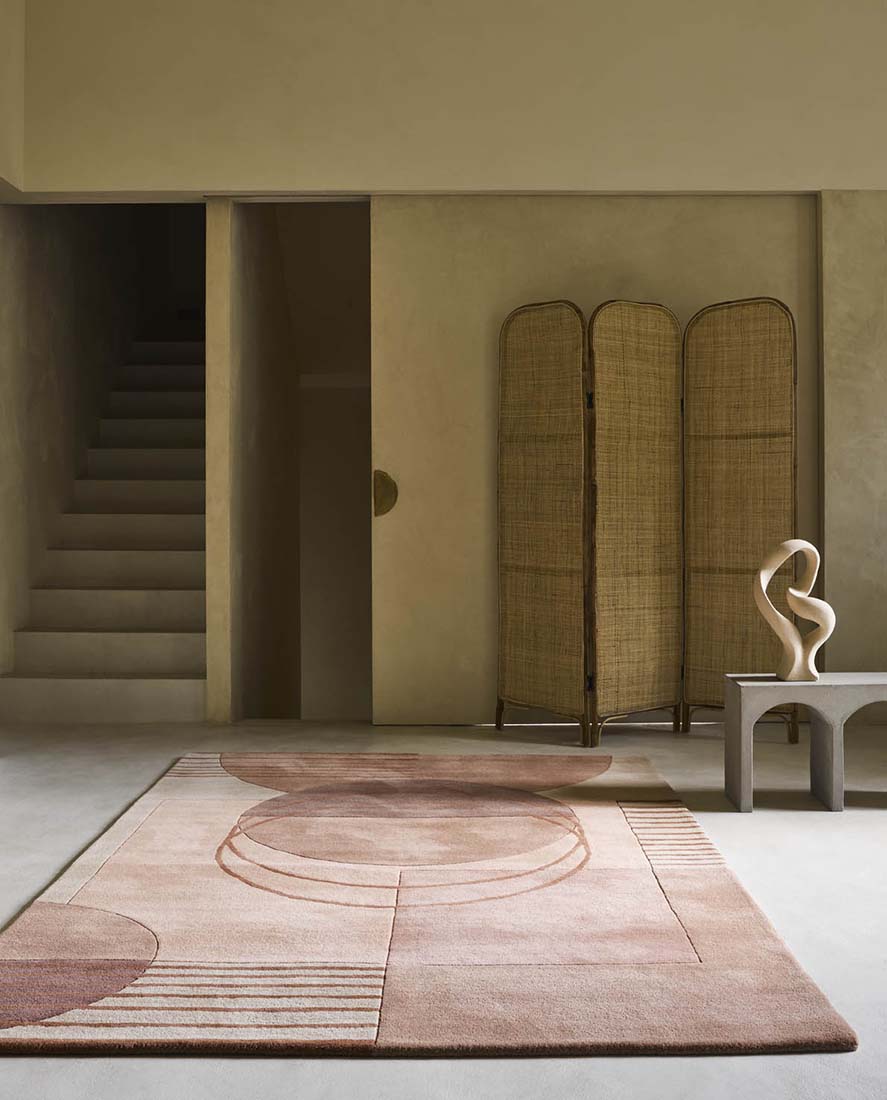 pink wool area rug with modern geometric design