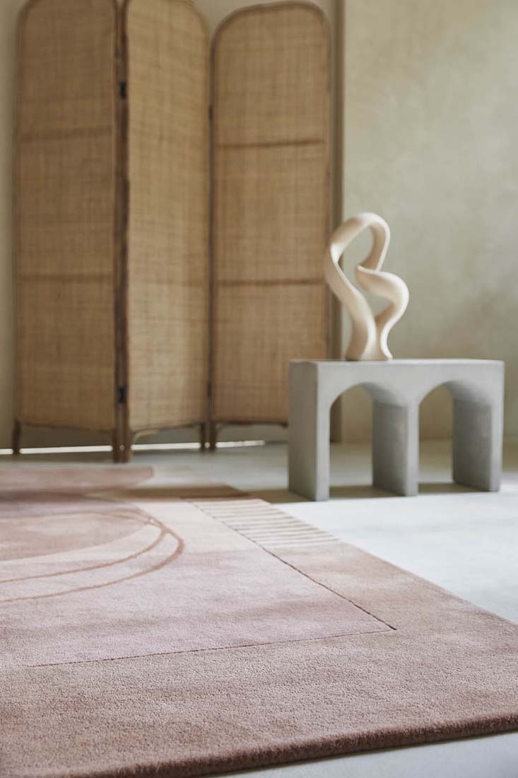 pink wool area rug with modern geometric design