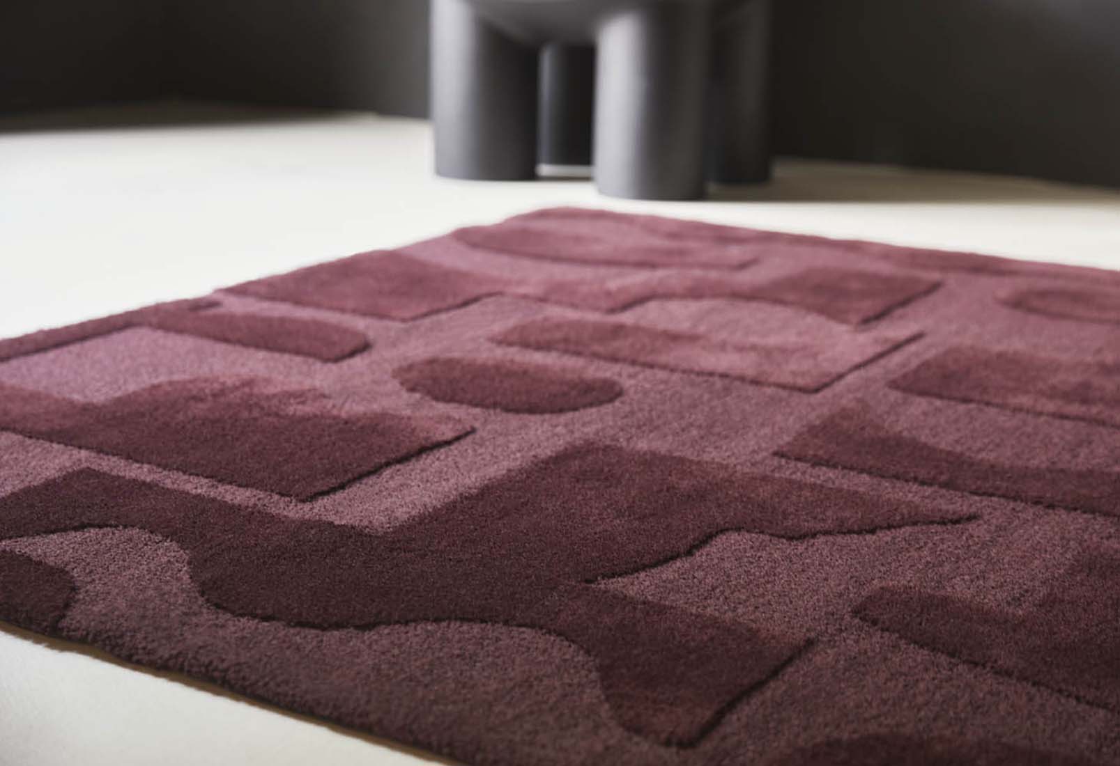 burgundy wool rug with geometric textured design