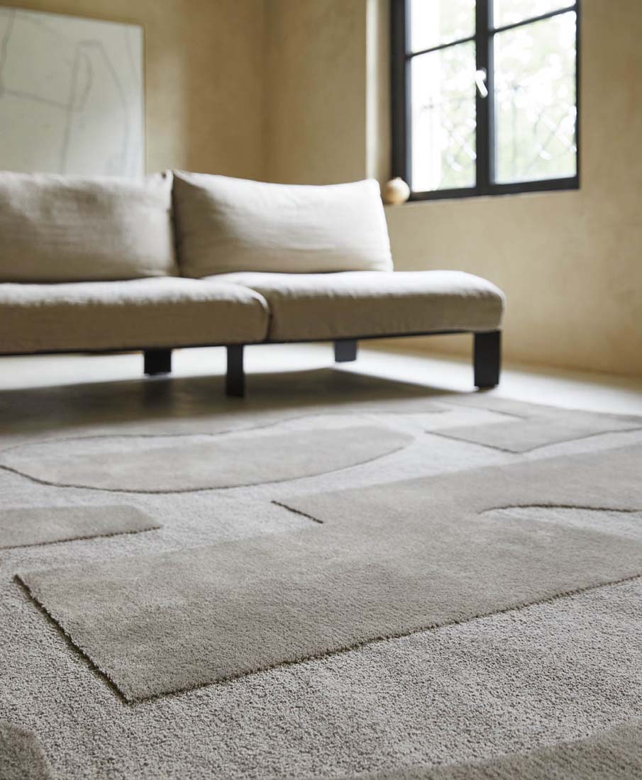 beige wool rug with geometric textured design