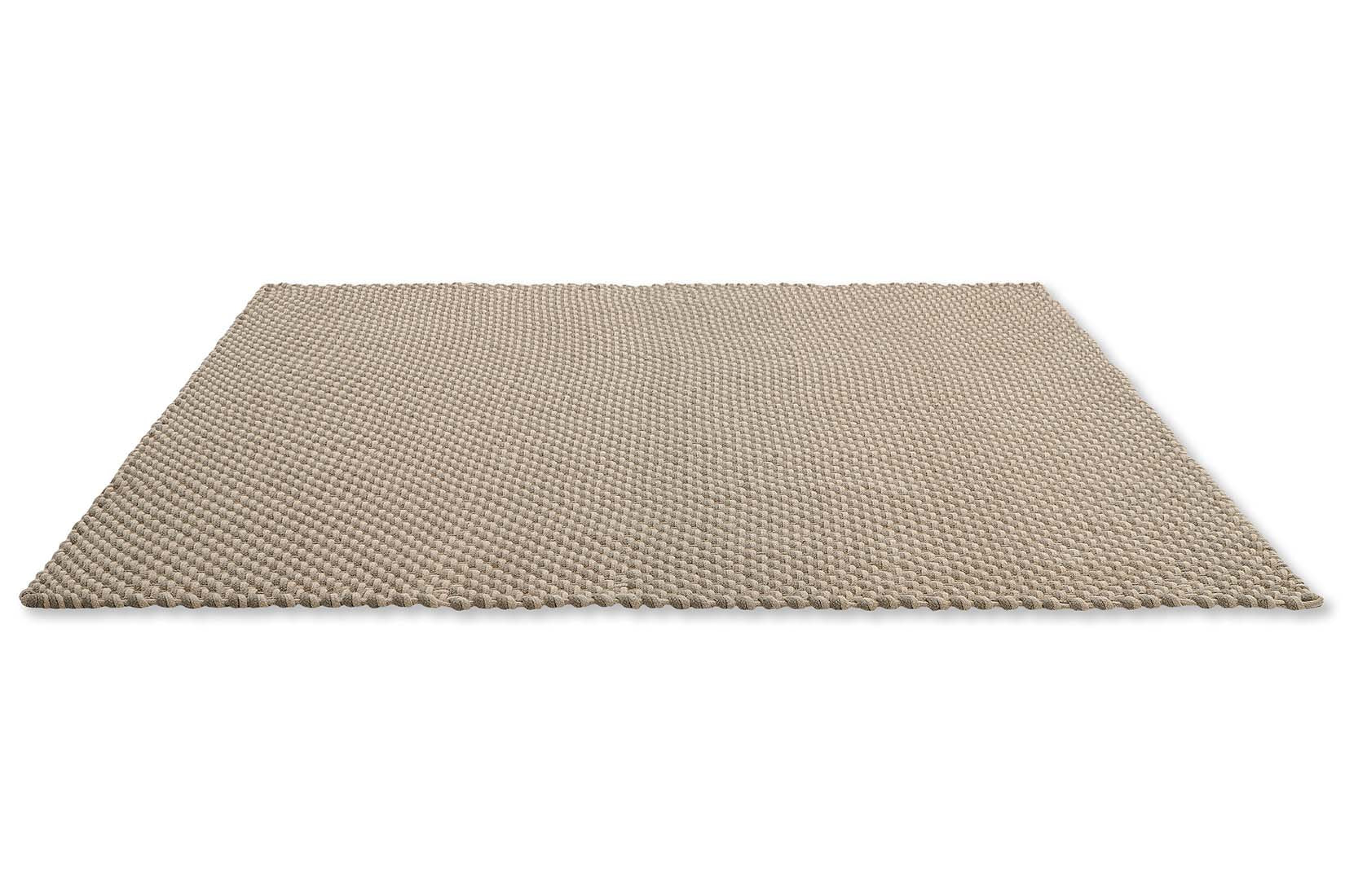 eco-conscious taupe and beige modern indoor outdoor polyethylene water resistant luxury rug
