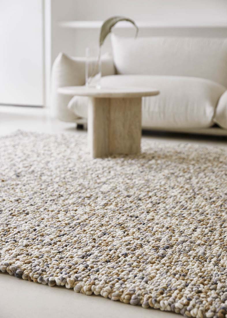 grey and beige textured area rug