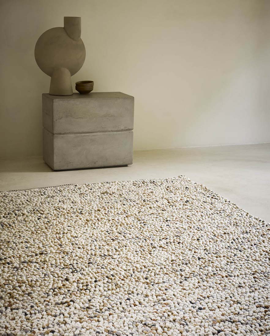 grey and beige textured area rug