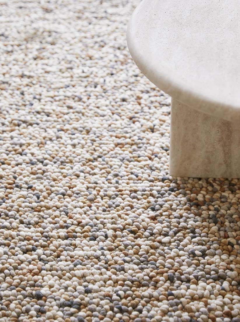 grey and beige textured area rug