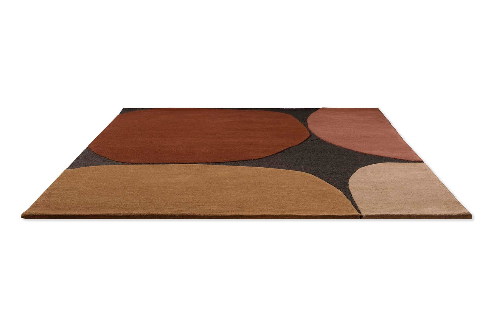 black wool rug with red shapes