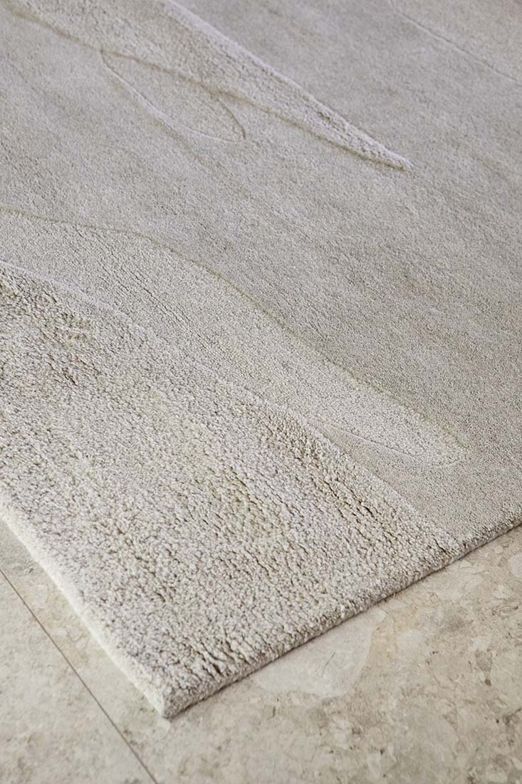 grey wool rug with shapes