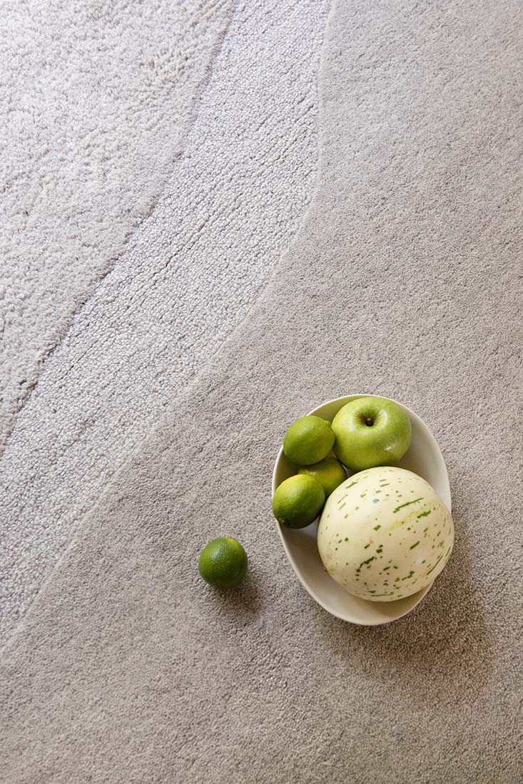 grey wool rug with shapes