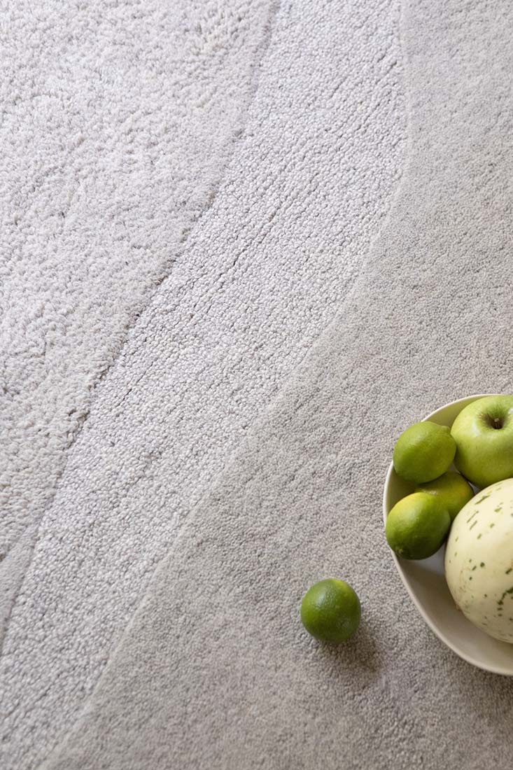 grey wool rug with shapes